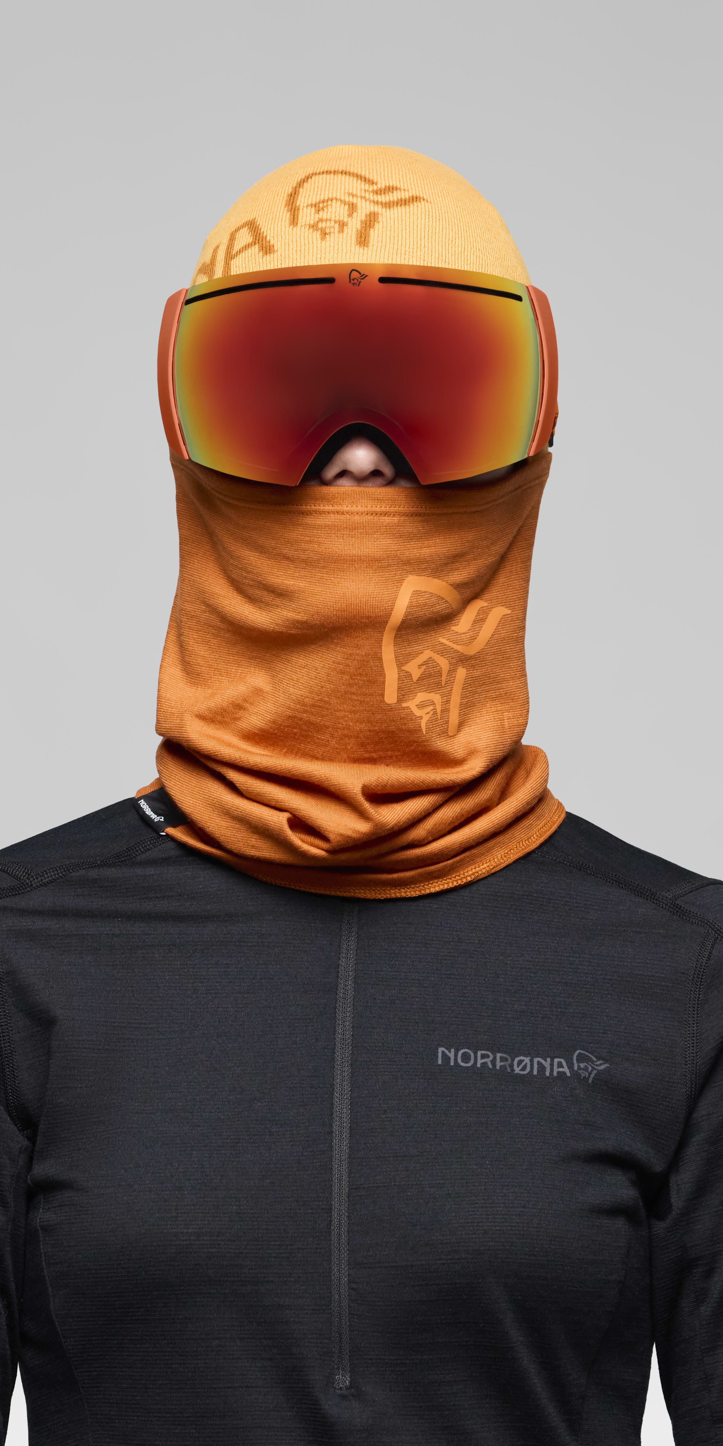 Female Look front image of lofoten Goggles Scarlet Ibis/Gold Fusion Mirror S2