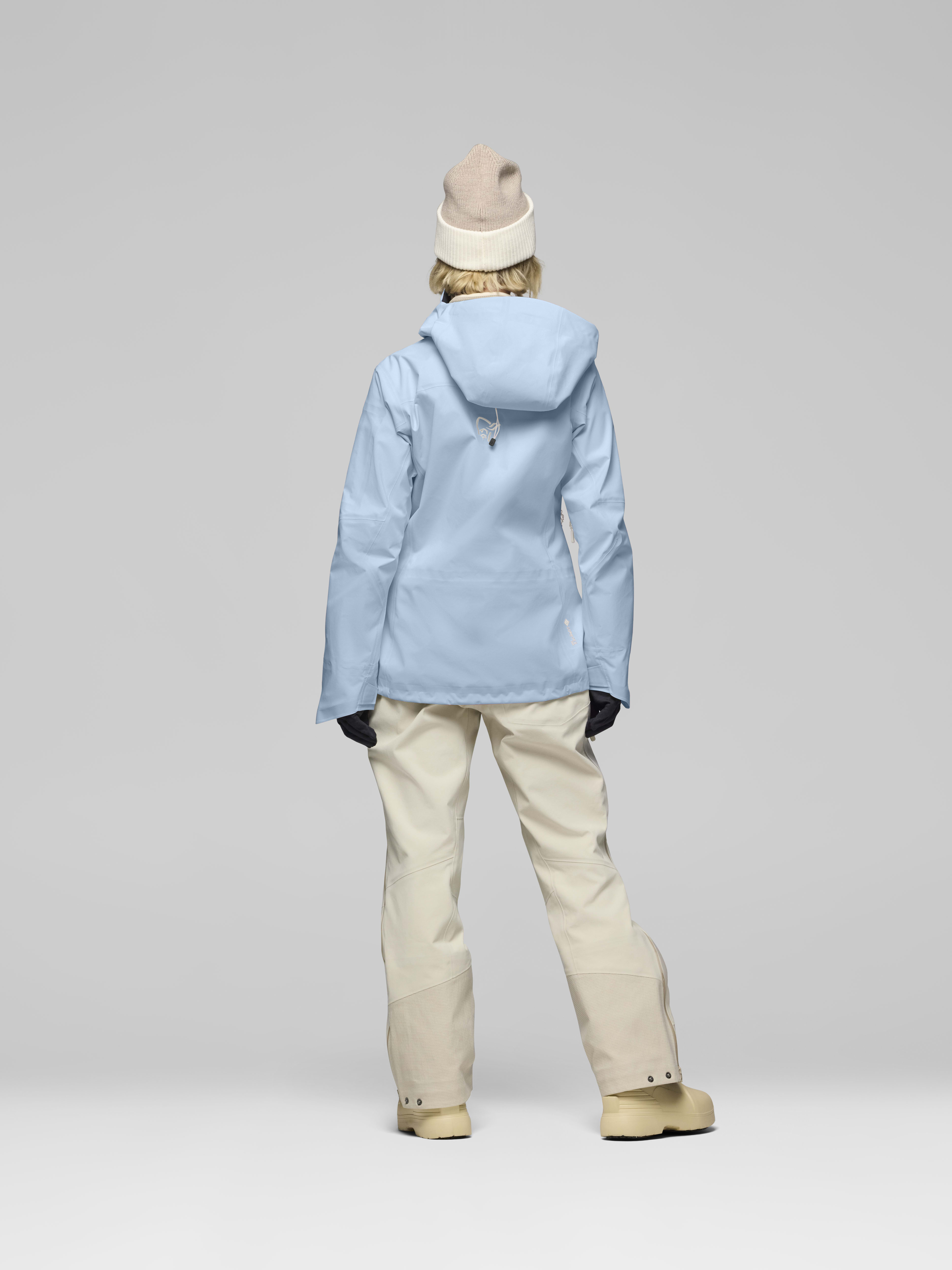 Female Look back image of lofoten Gore-Tex Pro Jacket Cashmere Blue