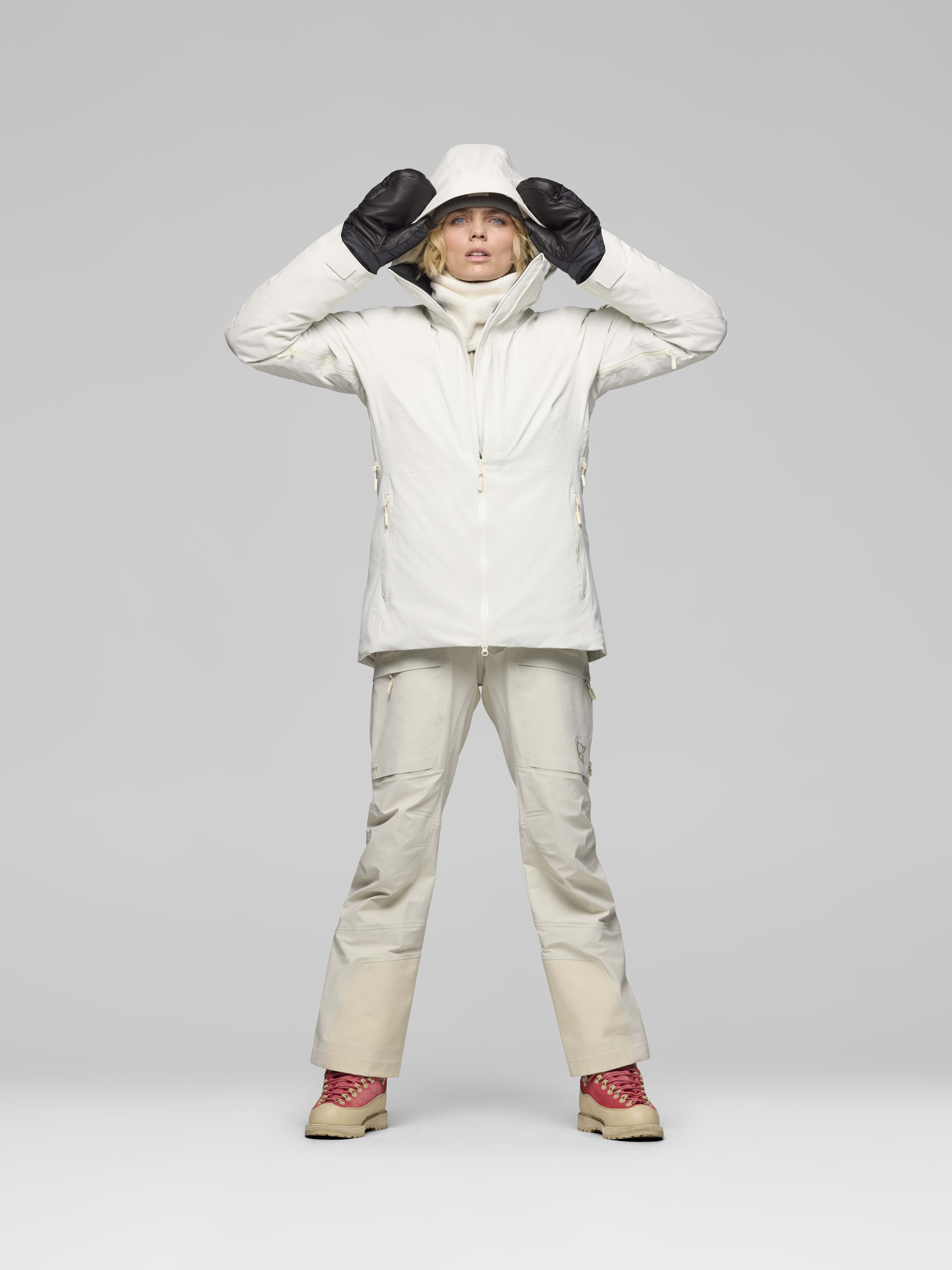 Female Look opening image of lofoten Gore-Tex down800 Jacket Whisper White
