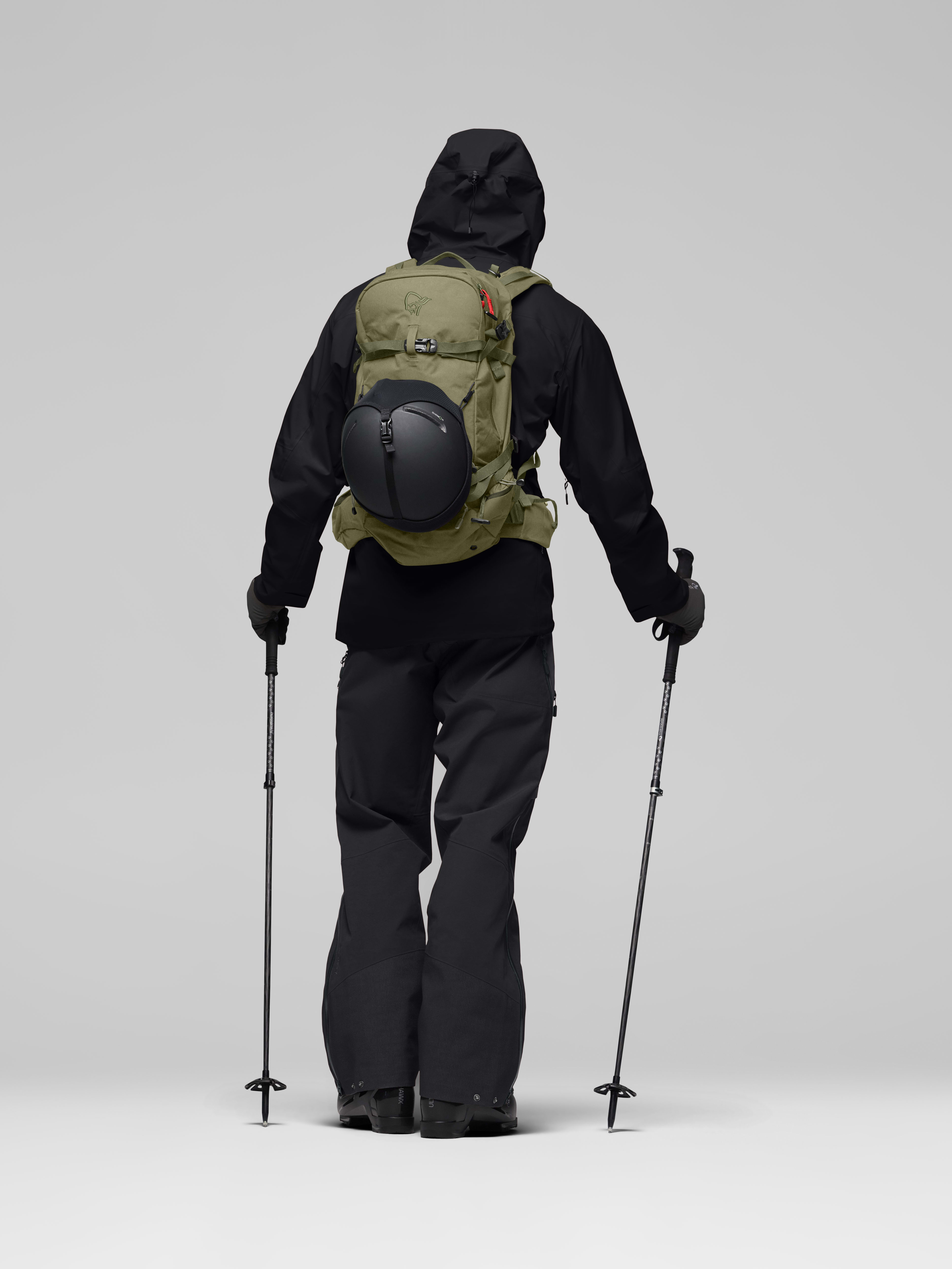 Female Look opening image of lofoten 30L Pack Deep Lichen Green
