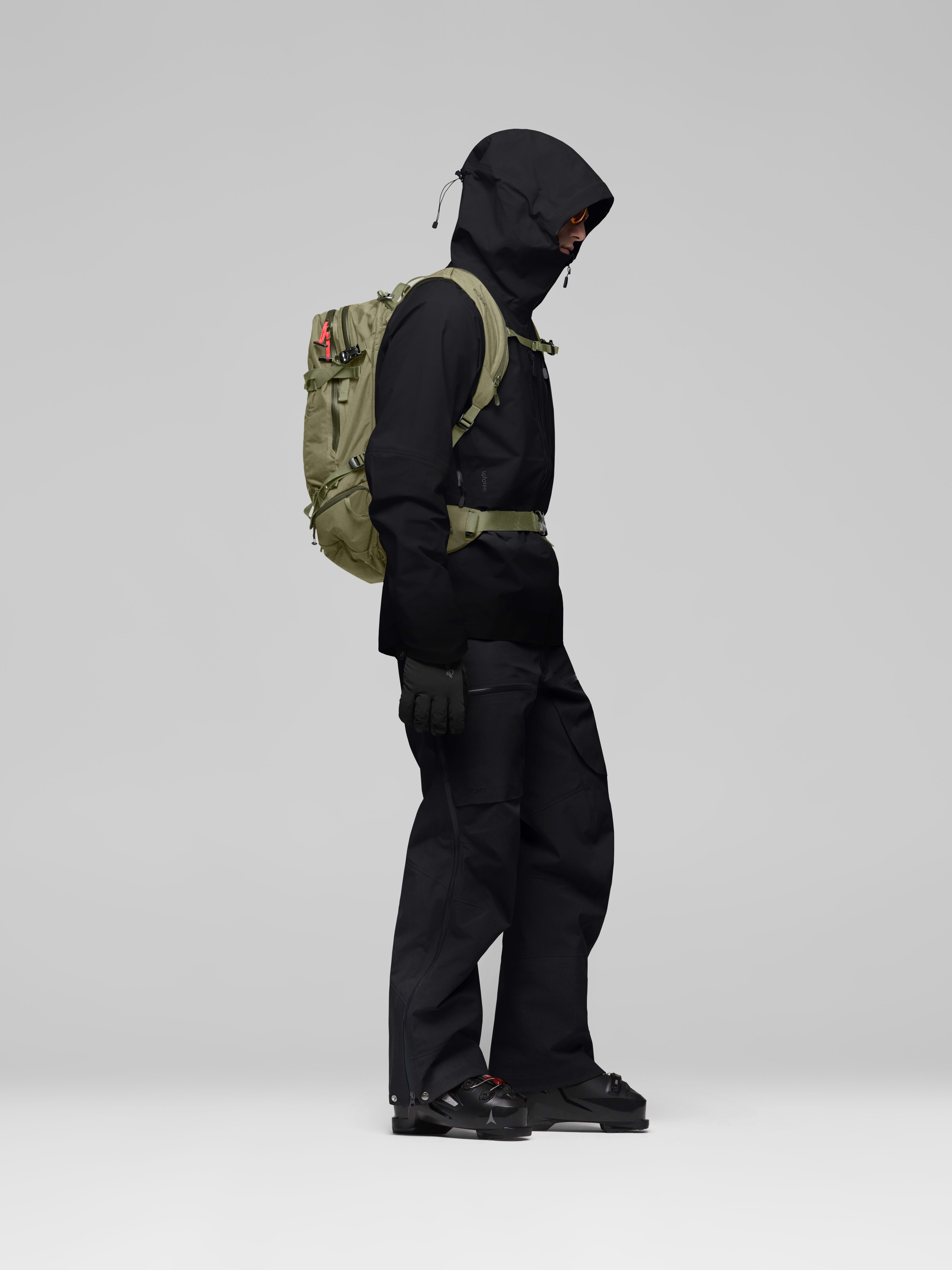 Female Look side image of lofoten 30L Pack Deep Lichen Green