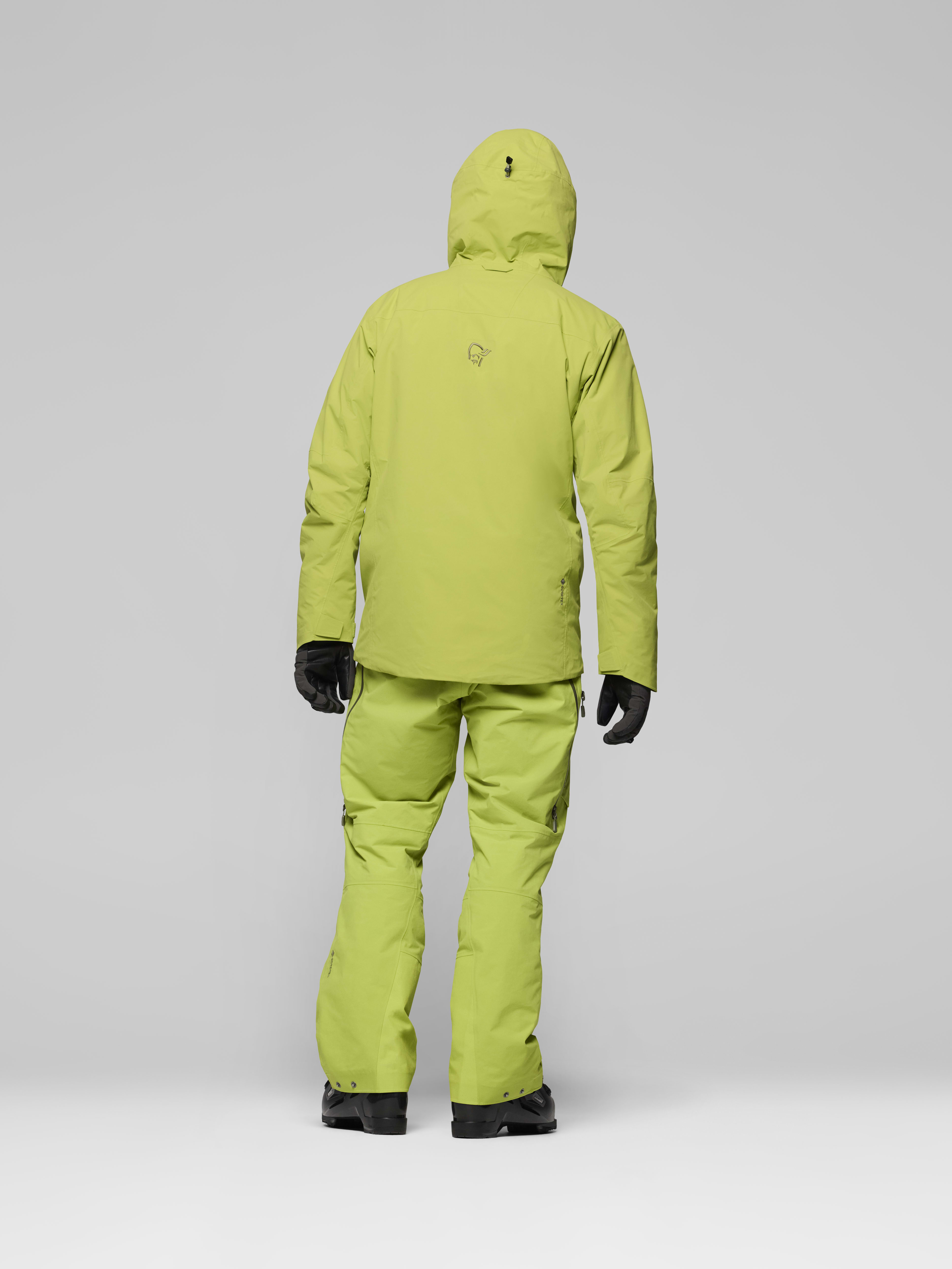 Male Look back image of lofoten Gore-Tex thermo80 Jacket Dark Citron