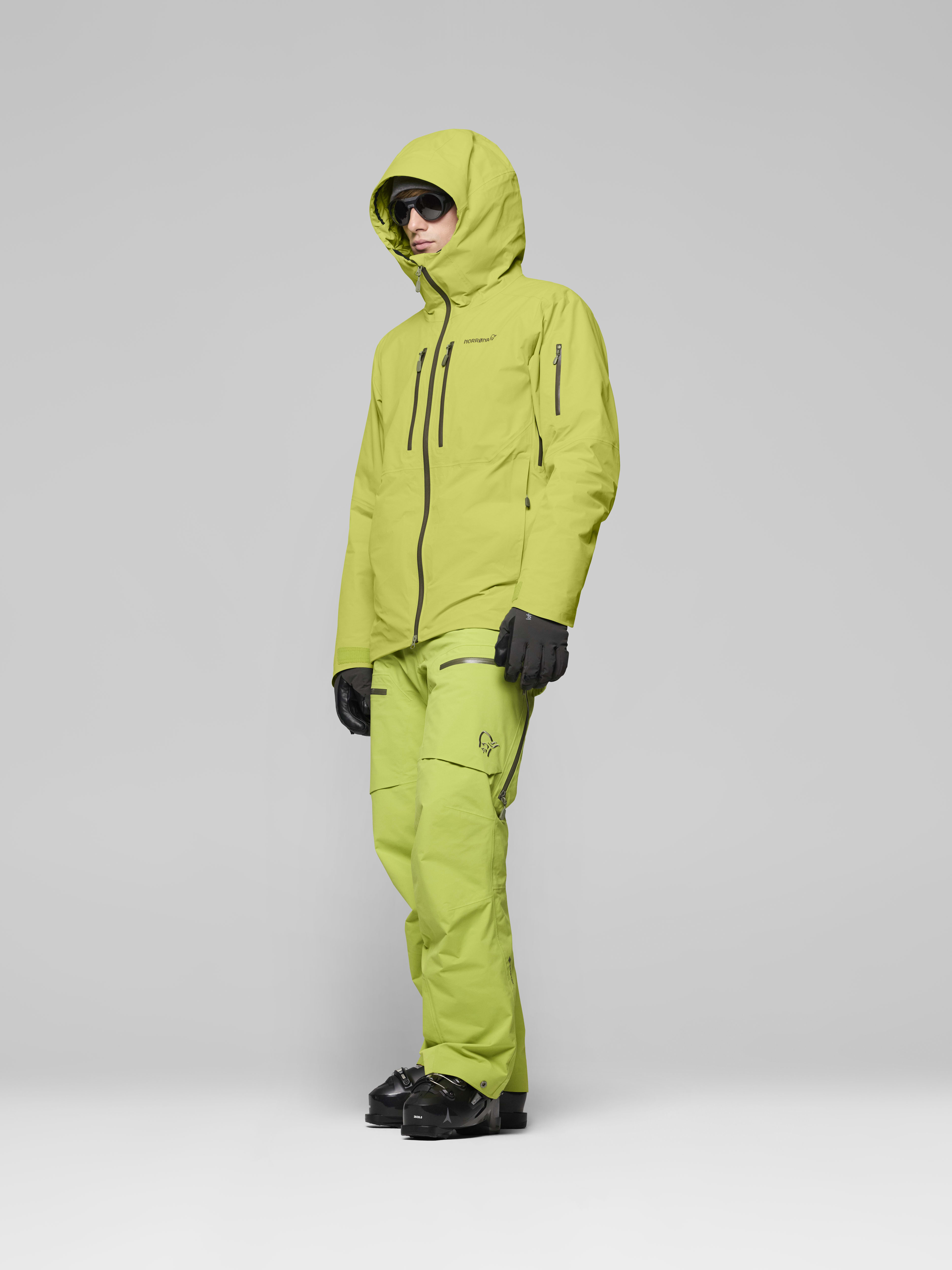Male Look side image of lofoten Gore-Tex thermo80 Jacket Dark Citron