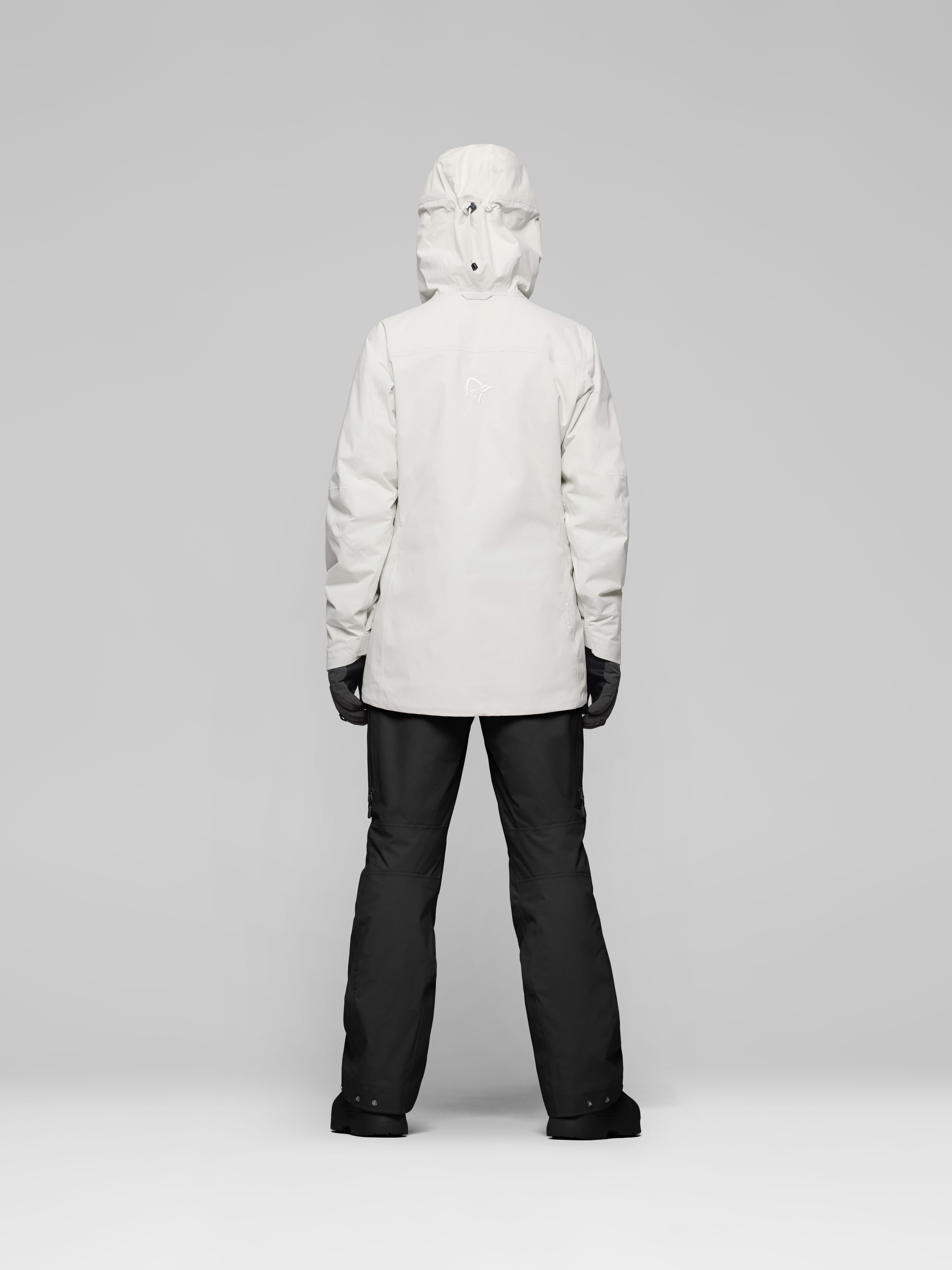 Female Look back image of lofoten Gore-Tex thermo80 Jacket Whisper White