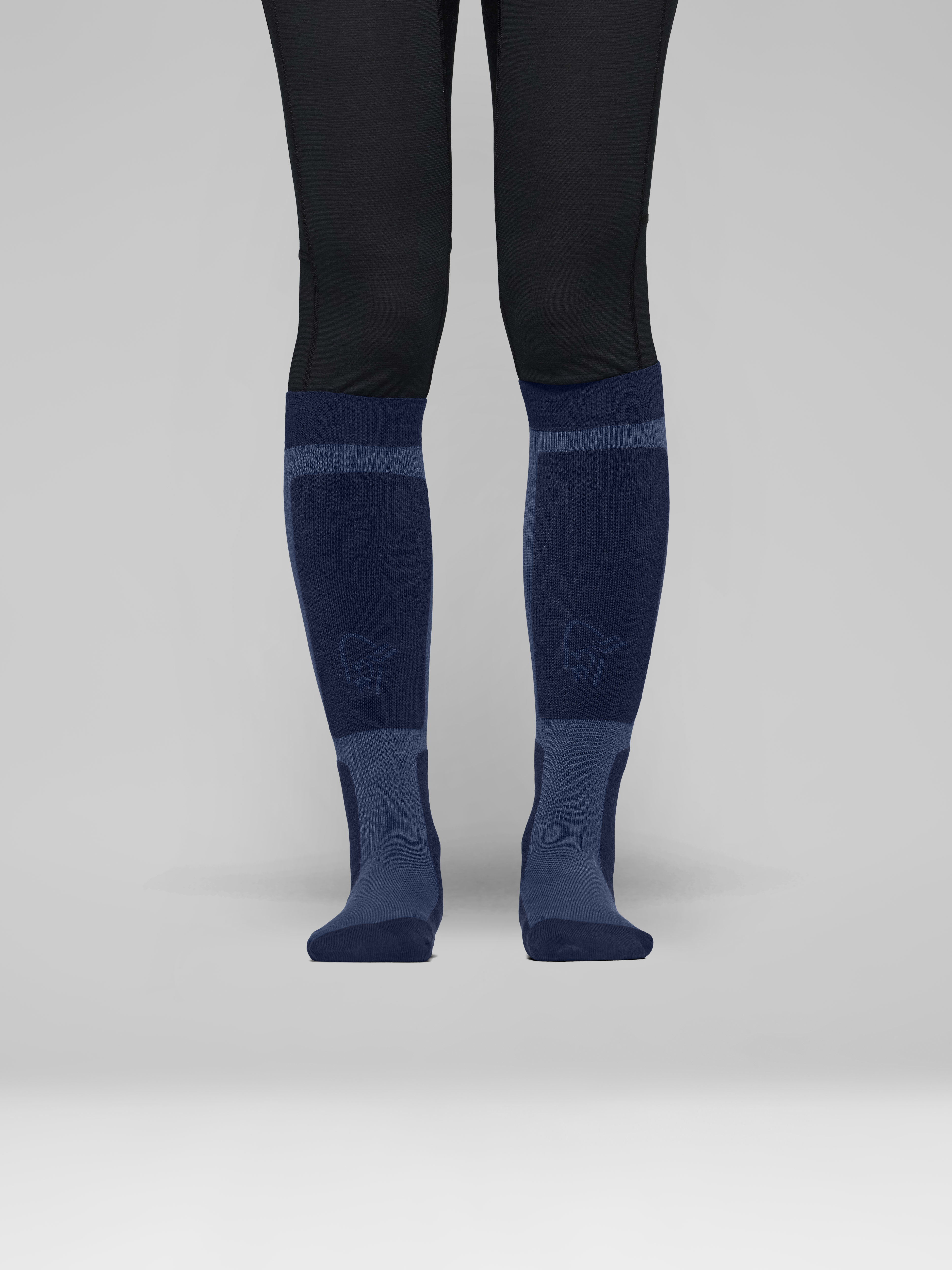 Female Look front image of lofoten mid merinoUll long Socks Indigo Night/Dark Denim