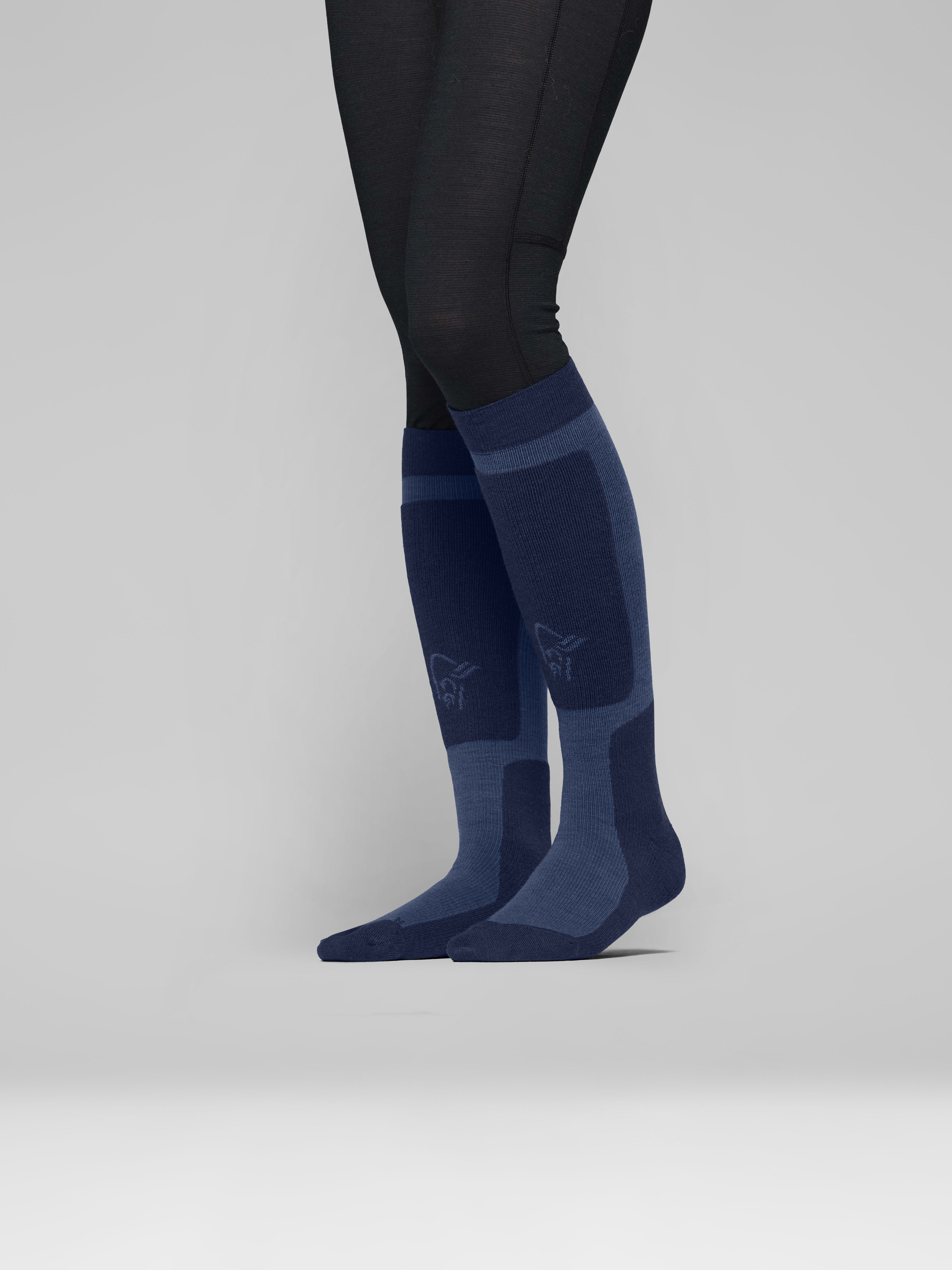 Female Look side image of lofoten mid merinoUll long Socks Indigo Night/Dark Denim