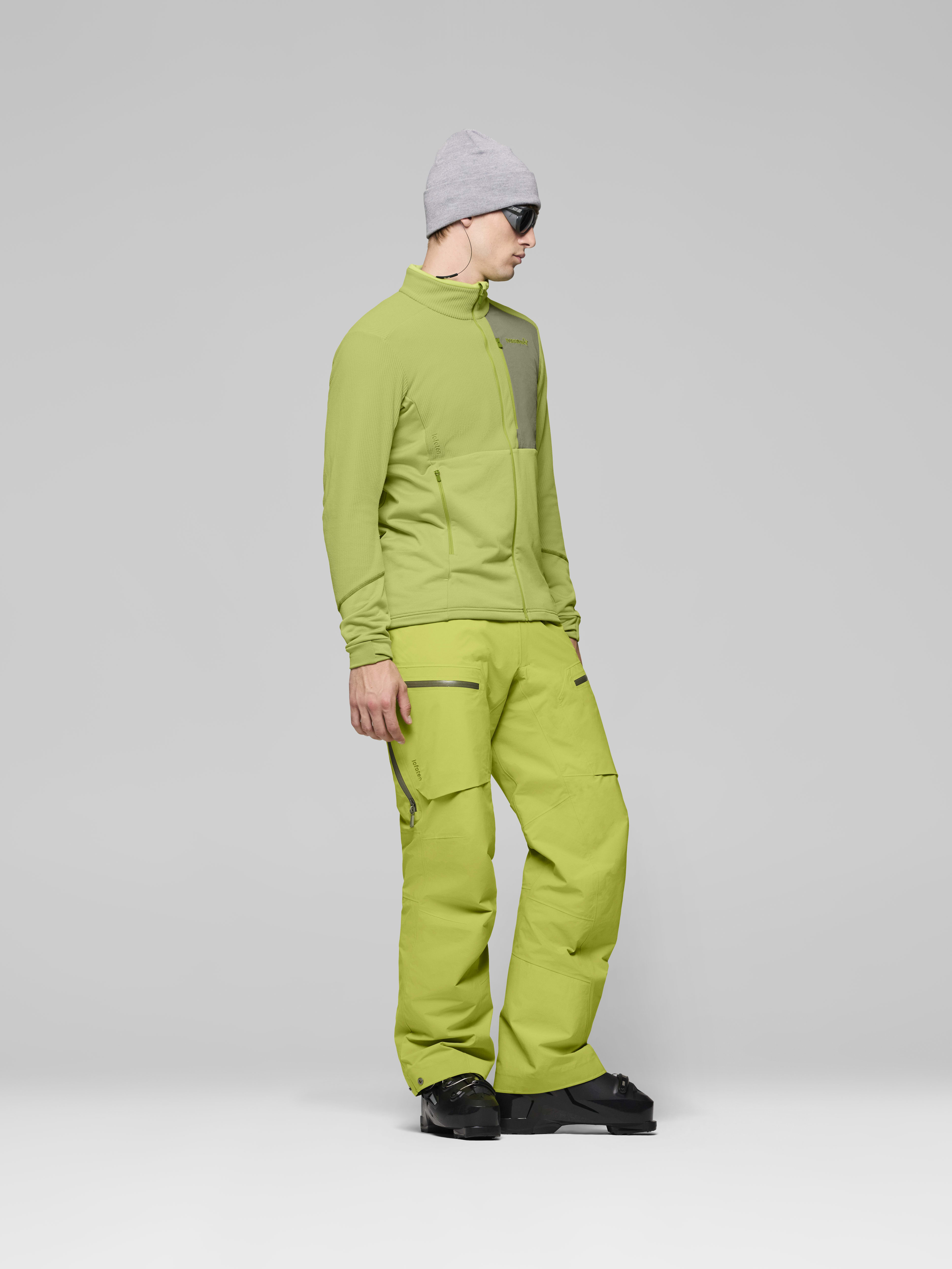 Male Look side image of lofoten warm2 Jacket Dark Citron/Deep Lichen Green