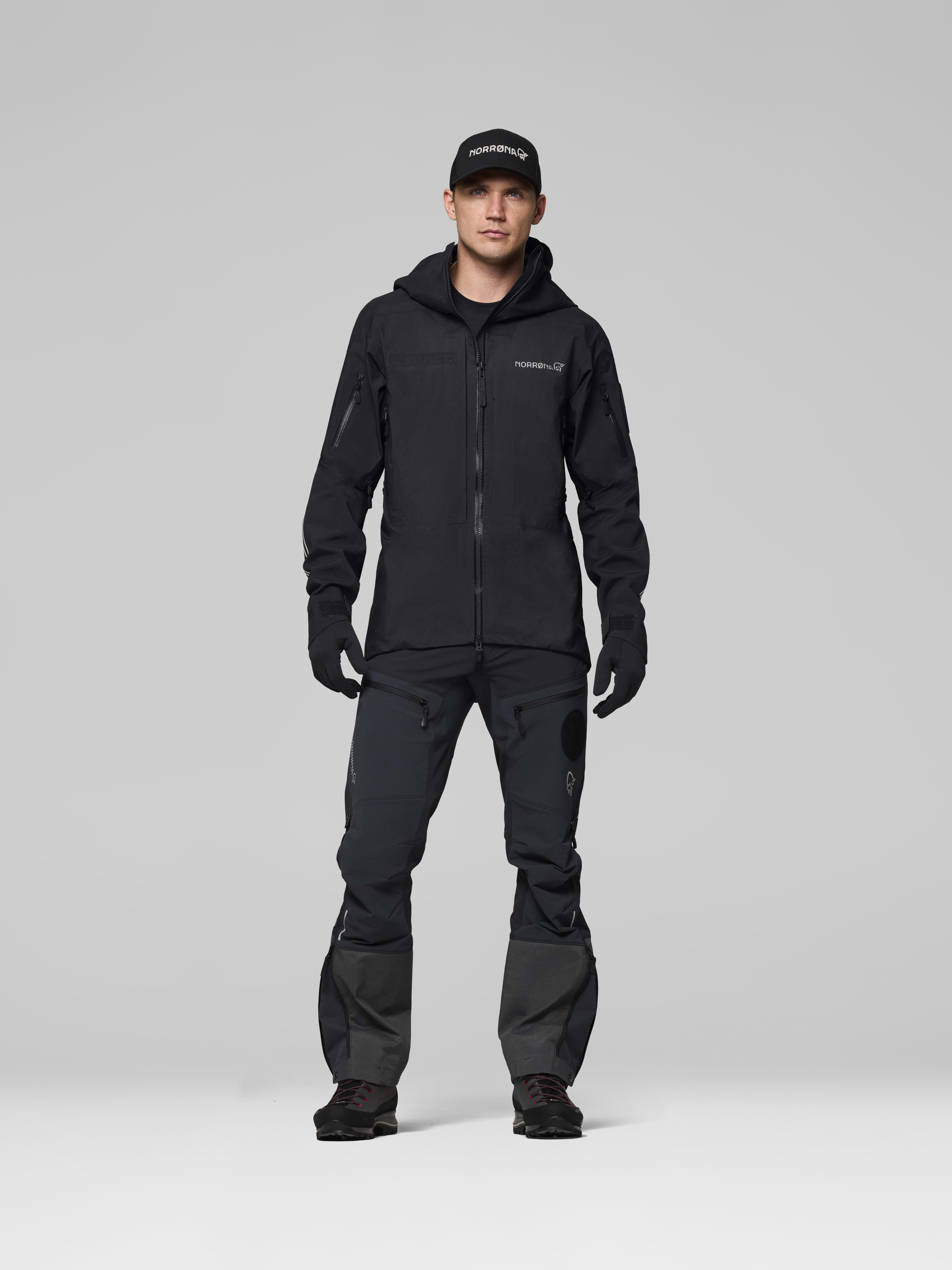 Male Look opening image of trollveggen Gore-Tex Pro rescue Jacket Caviar Black