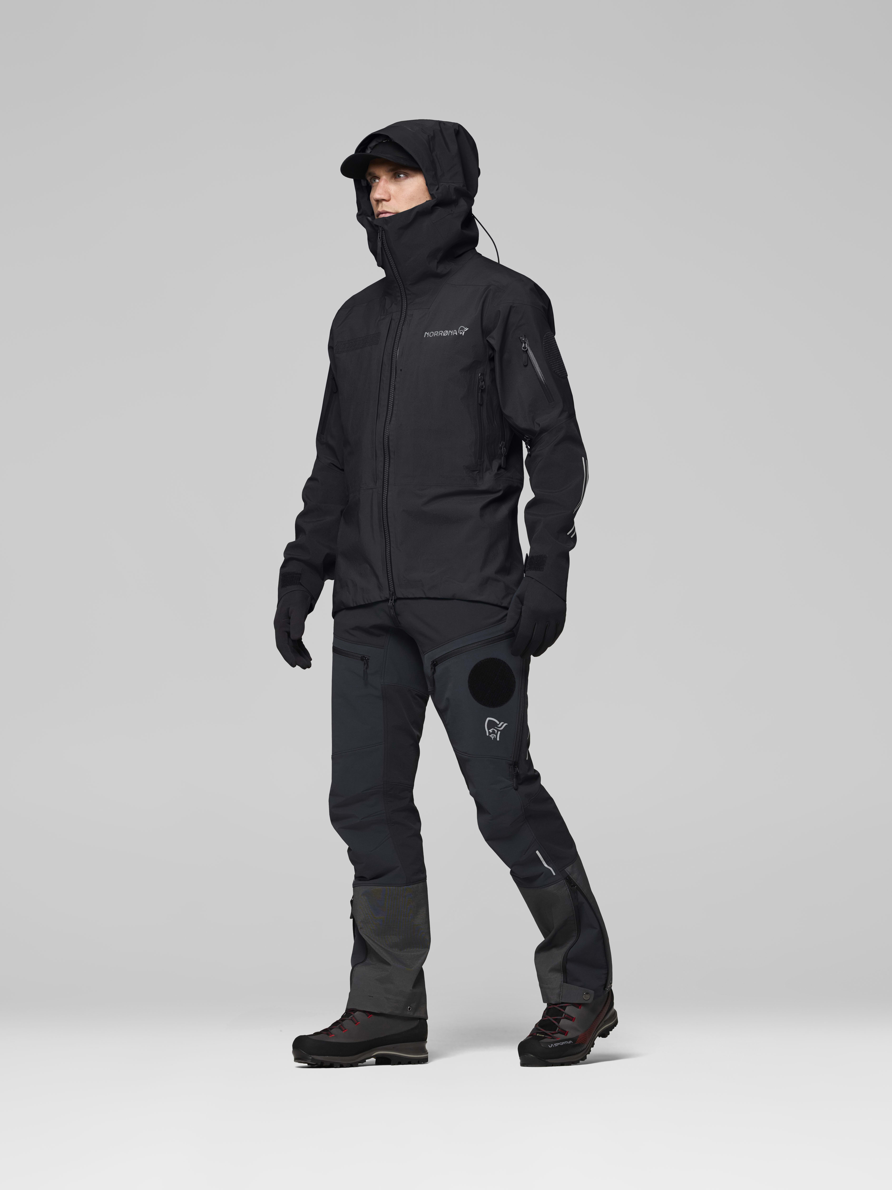 Male Look side image of trollveggen Gore-Tex Pro rescue Jacket Caviar Black