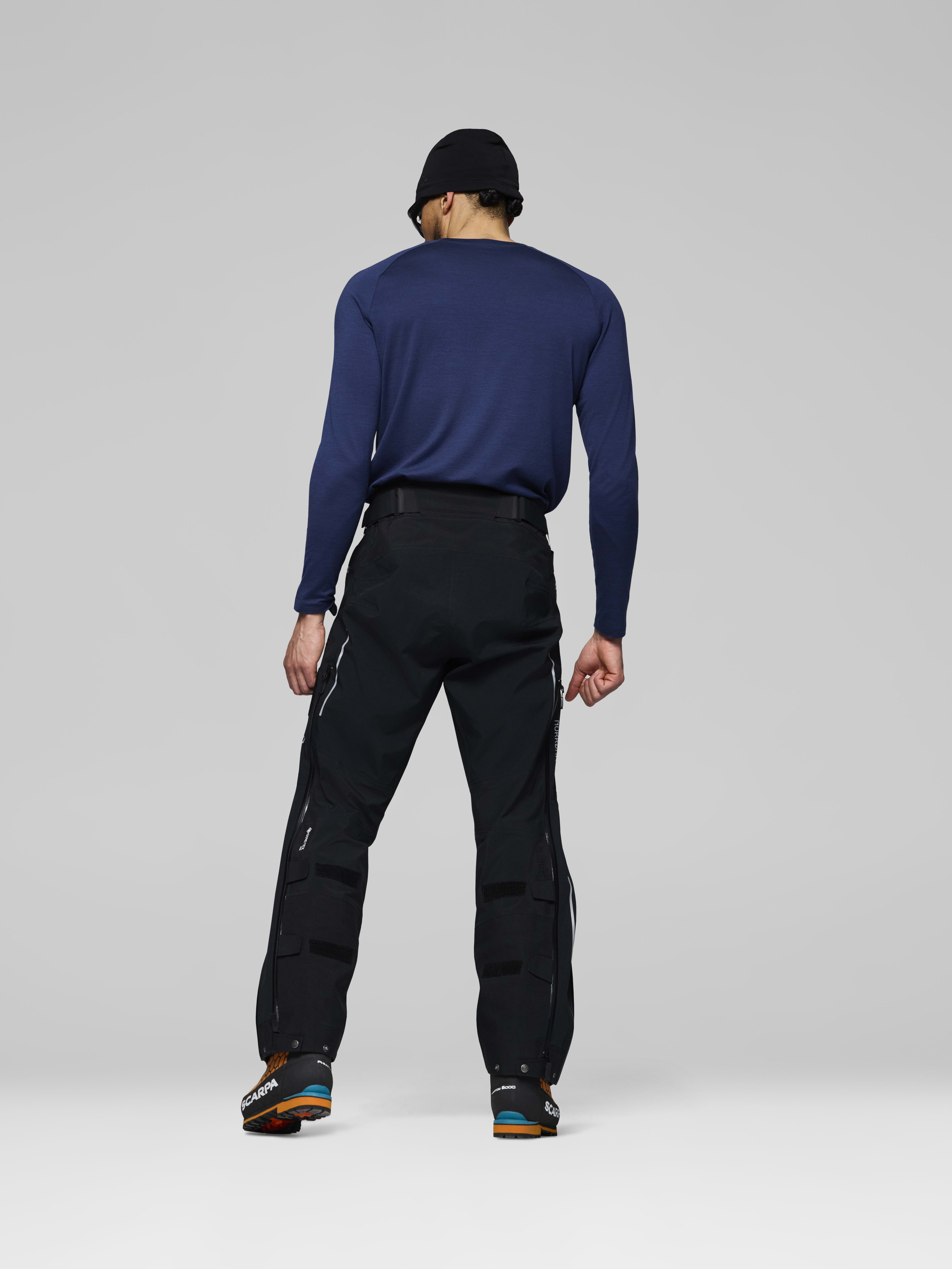 Male Look back image of trollveggen Gore-Tex Pro rescue Pants Caviar Black