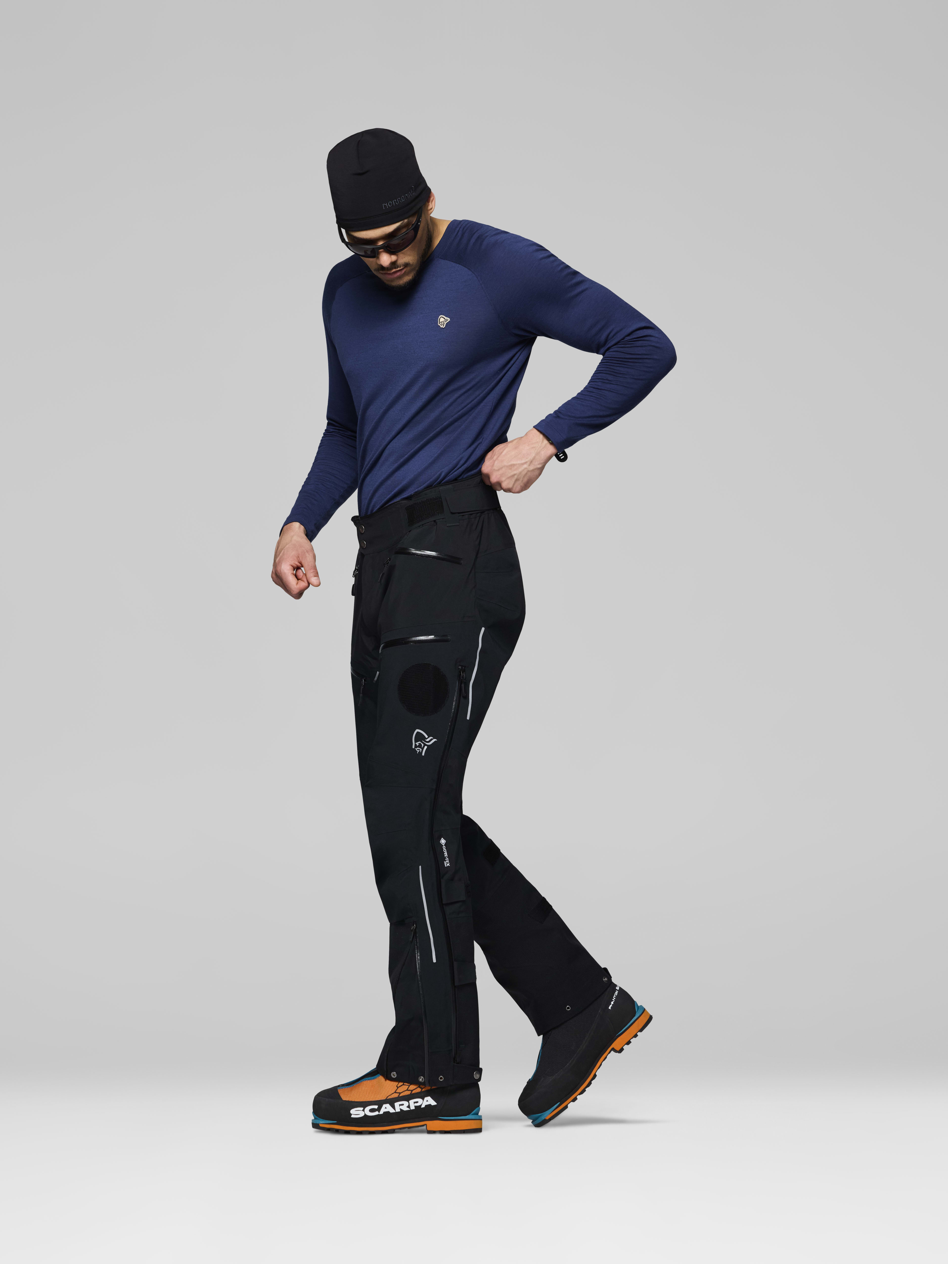 Male Look side image of trollveggen Gore-Tex Pro rescue Pants Caviar Black