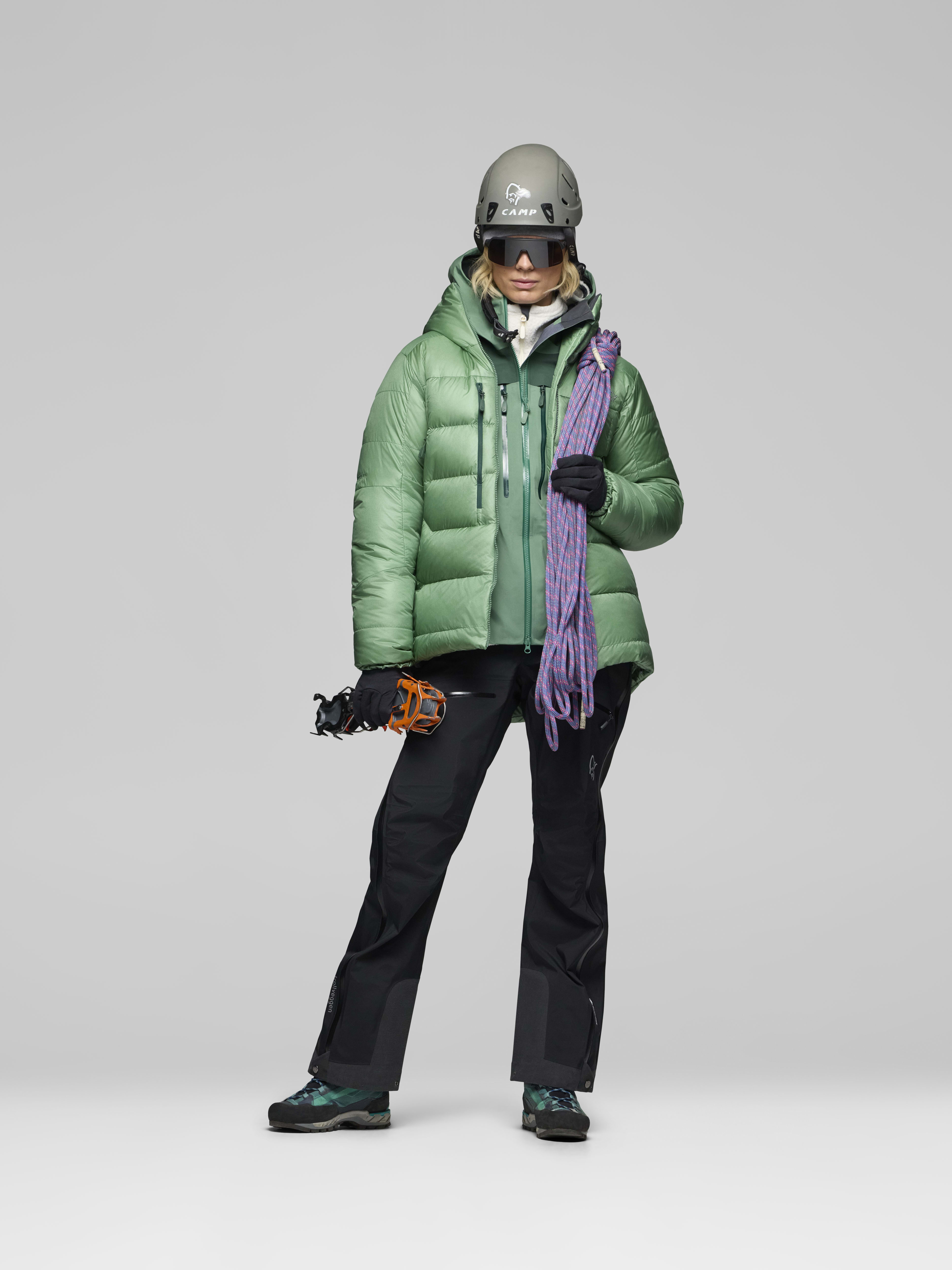 Female Look opening image of trollveggen down800 Hood Dark Ivy