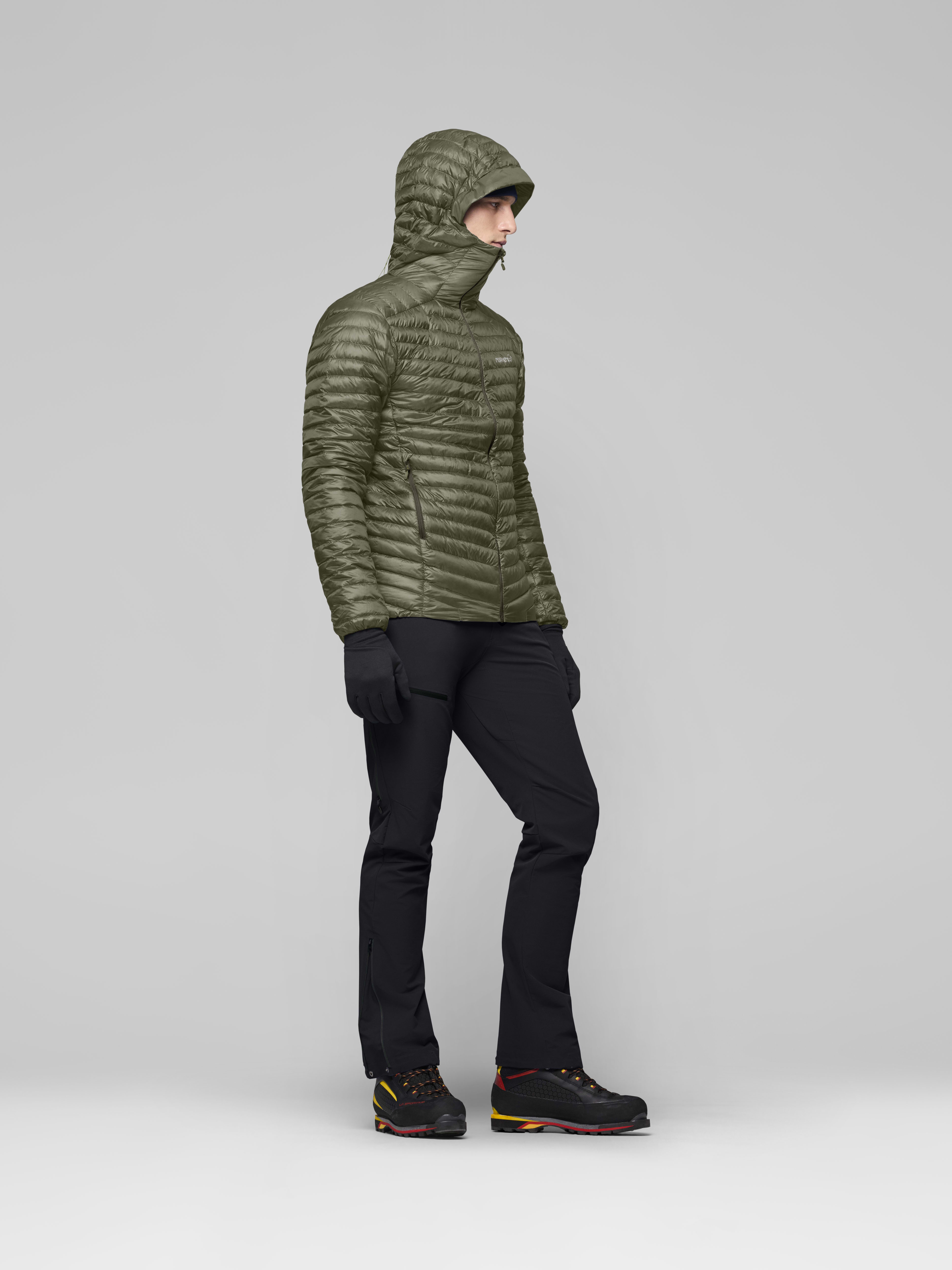 Male Look side image of trollveggen down800 super light Hood Deep Lichen Green
