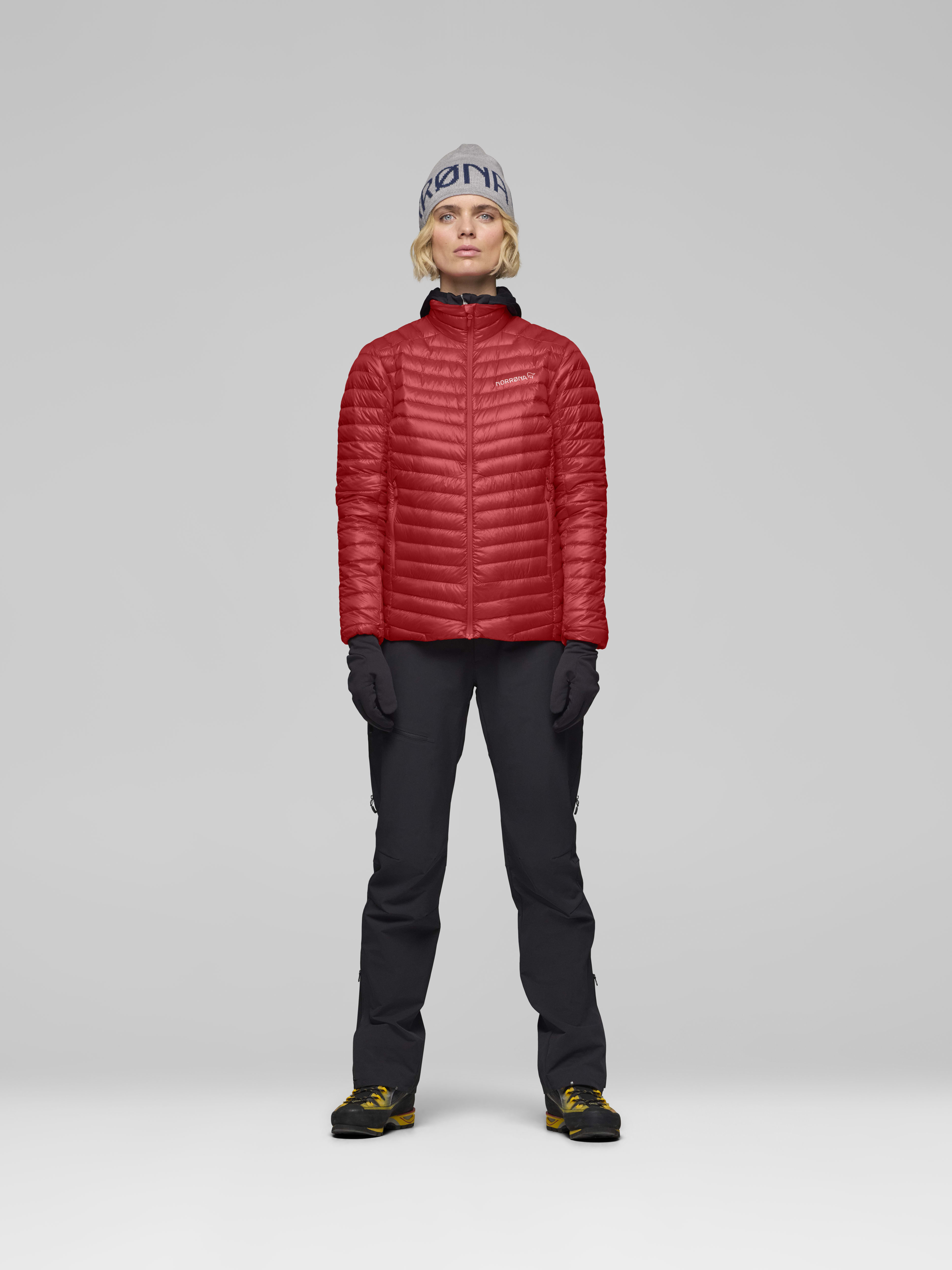 Female Look front image of trollveggen down800 super light Jacket Baked Apple