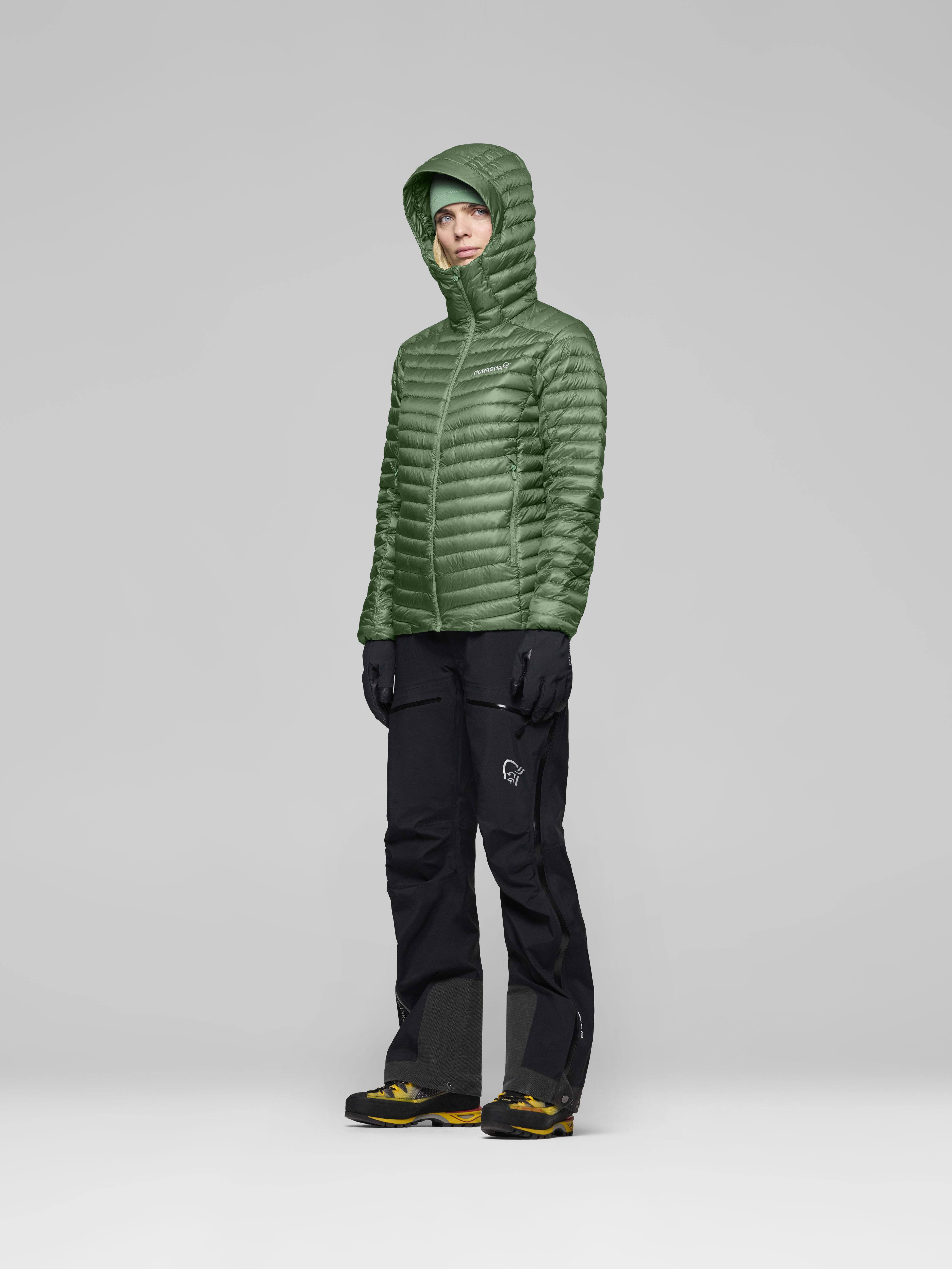 Female Look side image of trollveggen down800 super light Hood Dark Ivy