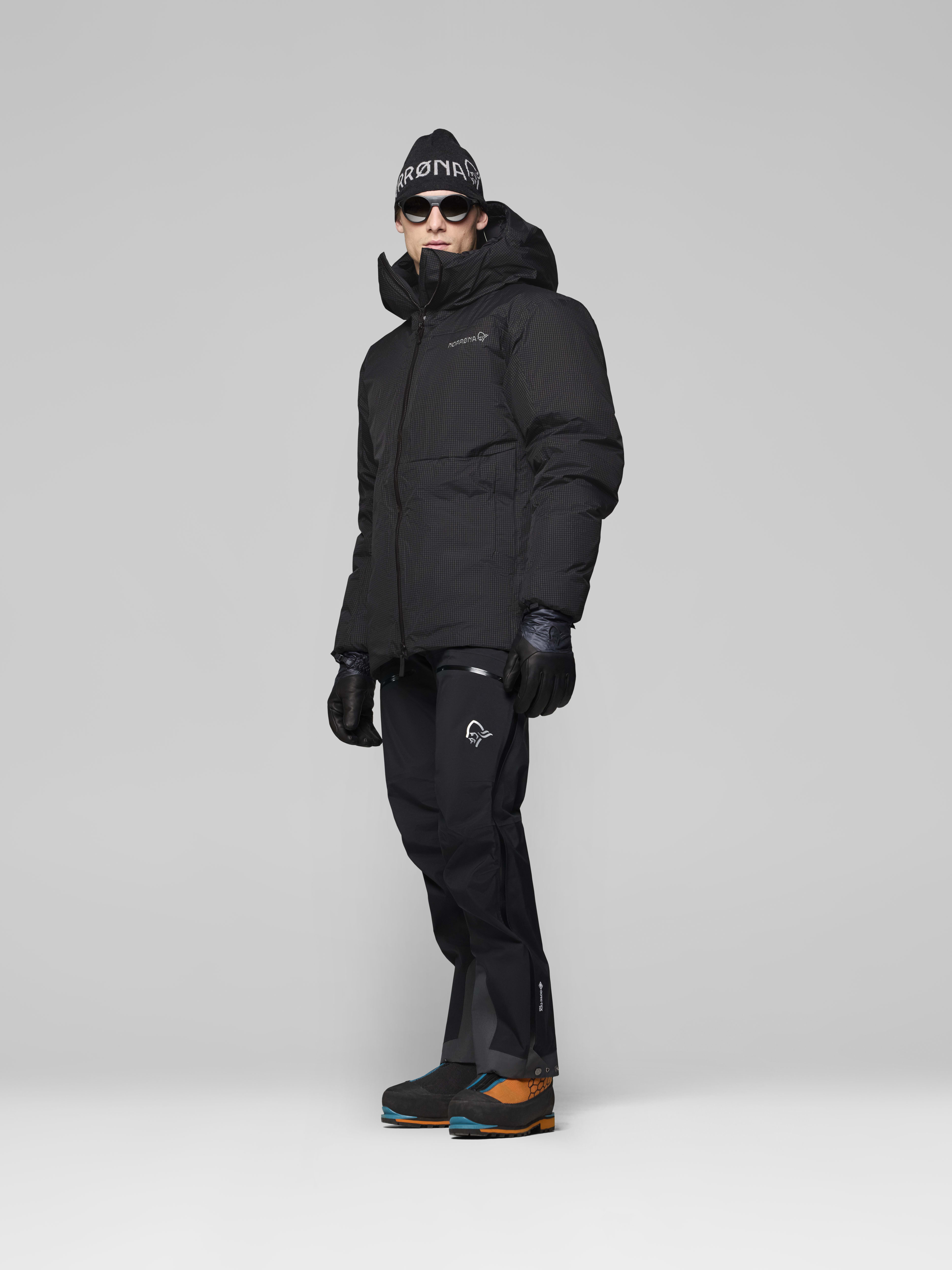 Male Look side image of trollveggen dri2 down800 Zip Hood Caviar Black