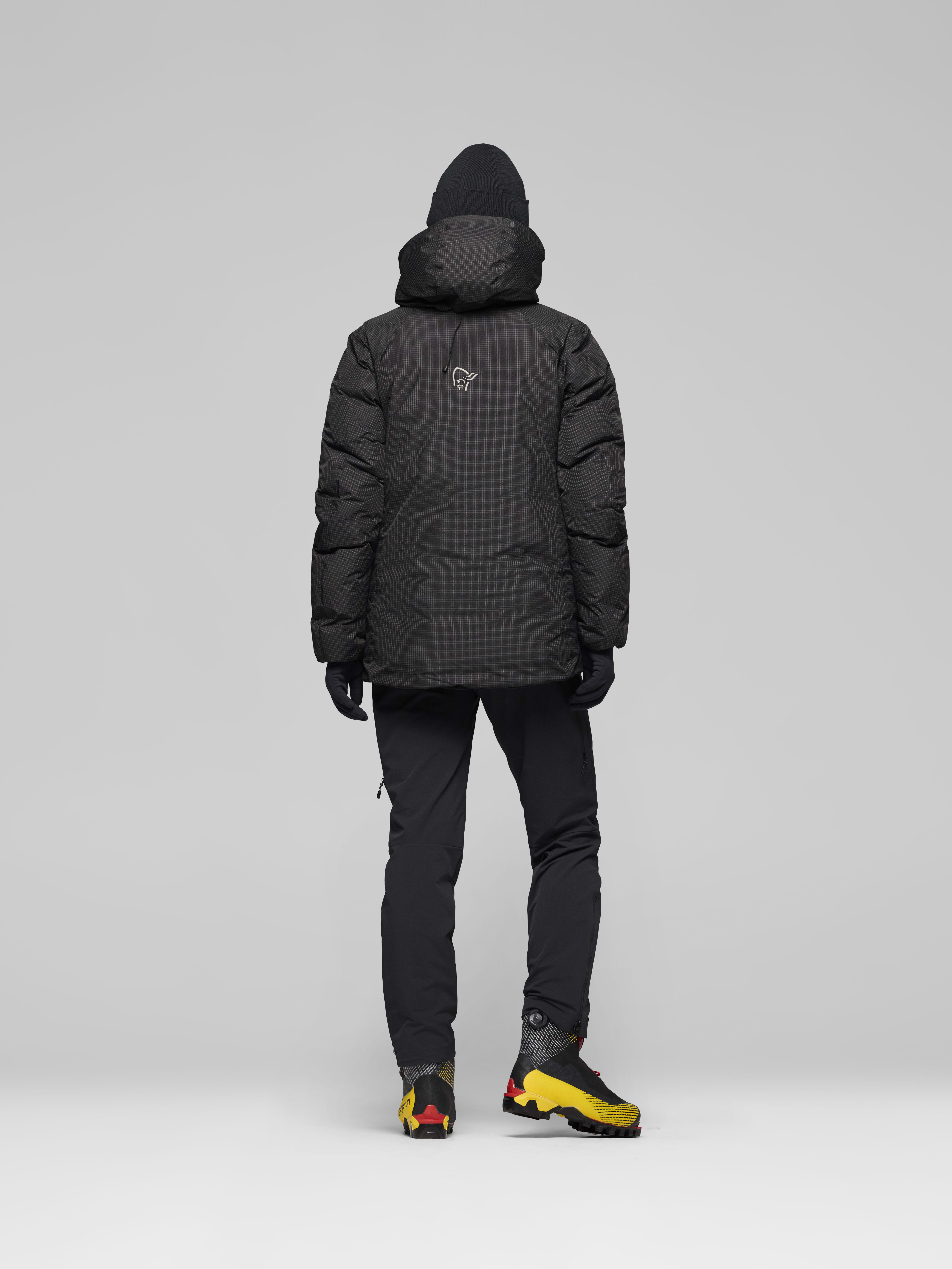 Female Look back image of trollveggen dri2 down800 Zip Hood Caviar Black