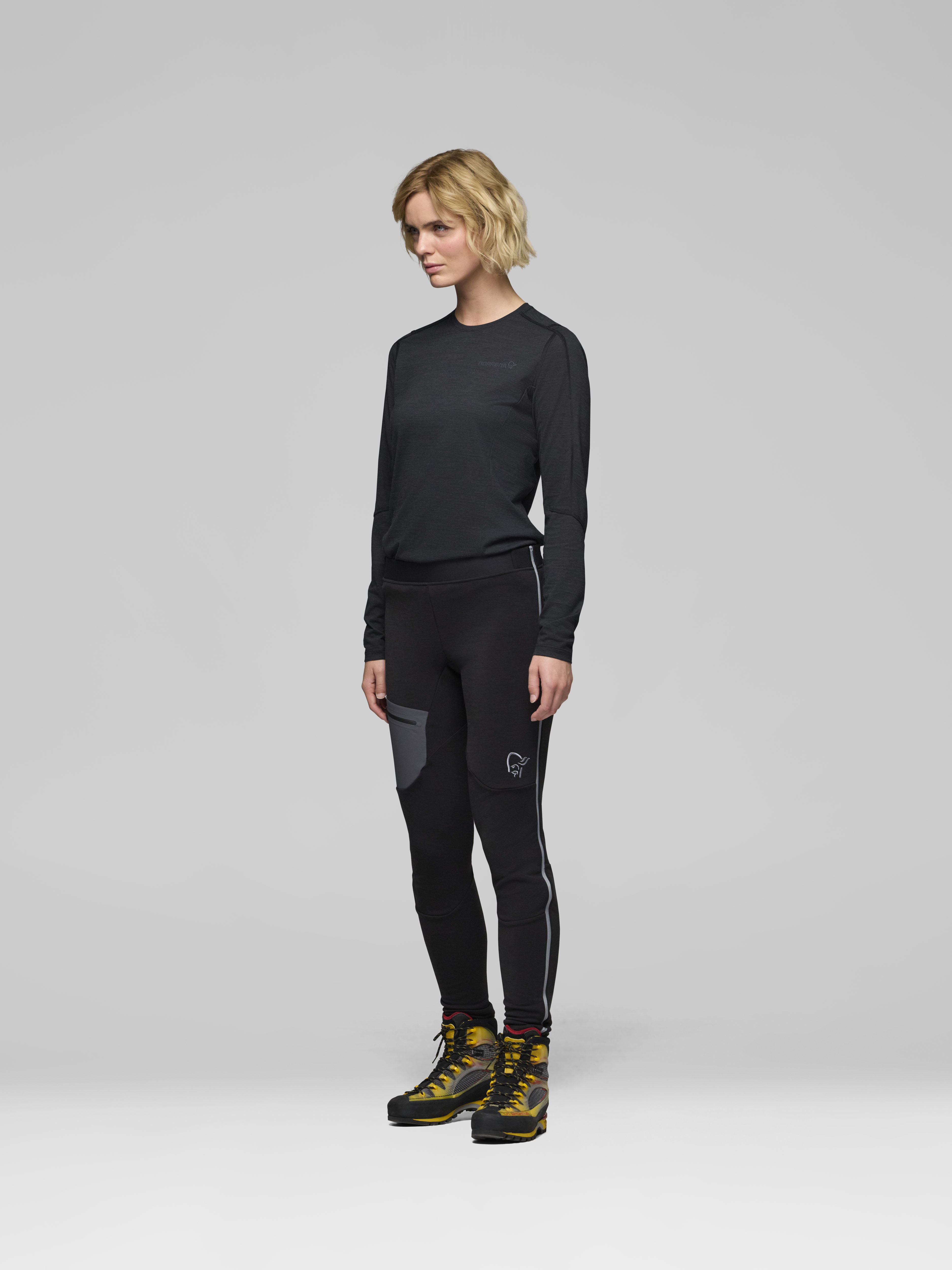 Female Look side image of trollveggen warmwool2 stretch Tights Caviar Black