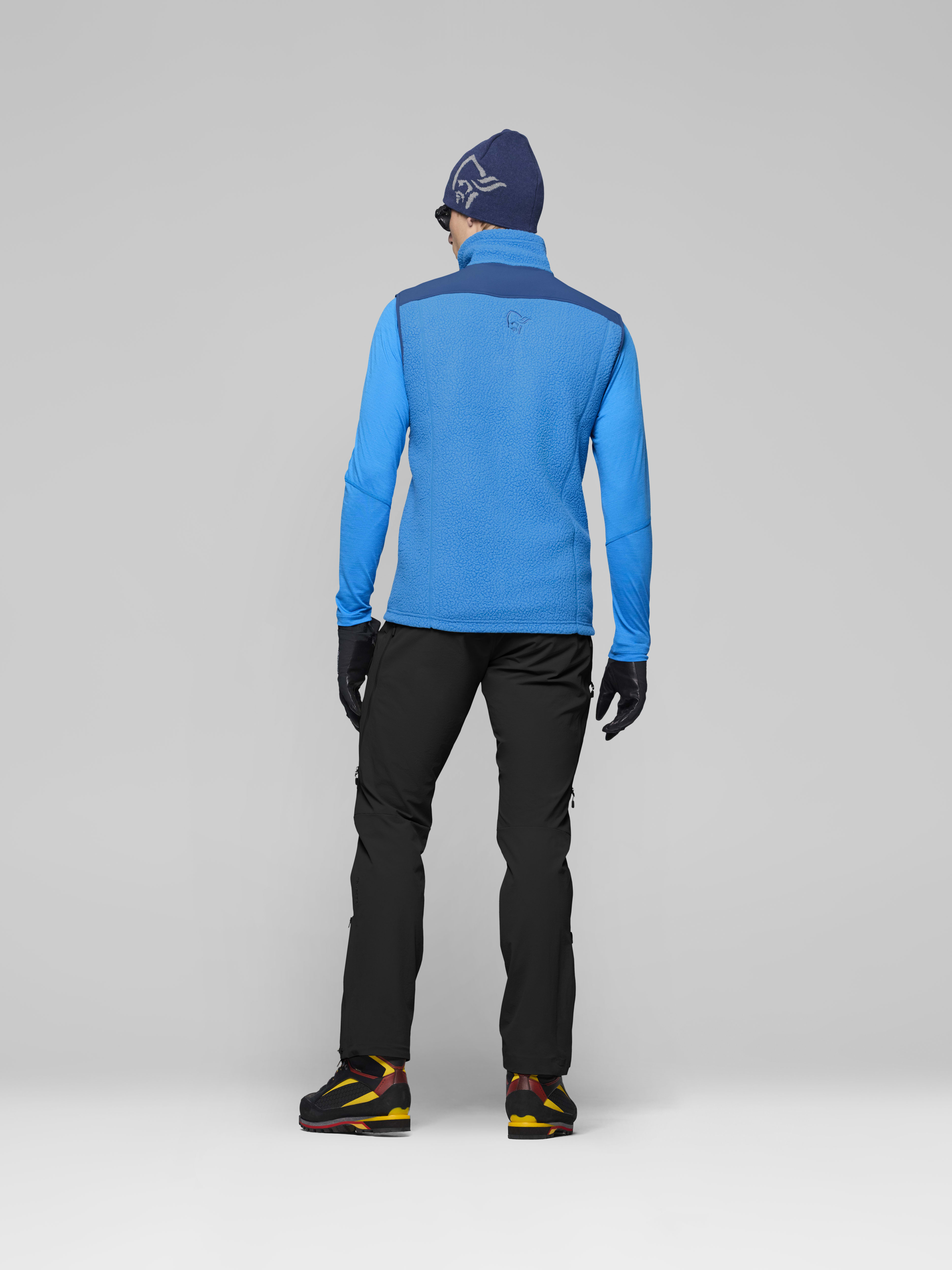 Male Look back image of trollveggen warm3 Vest Brilliant Blue/Dark Blue
