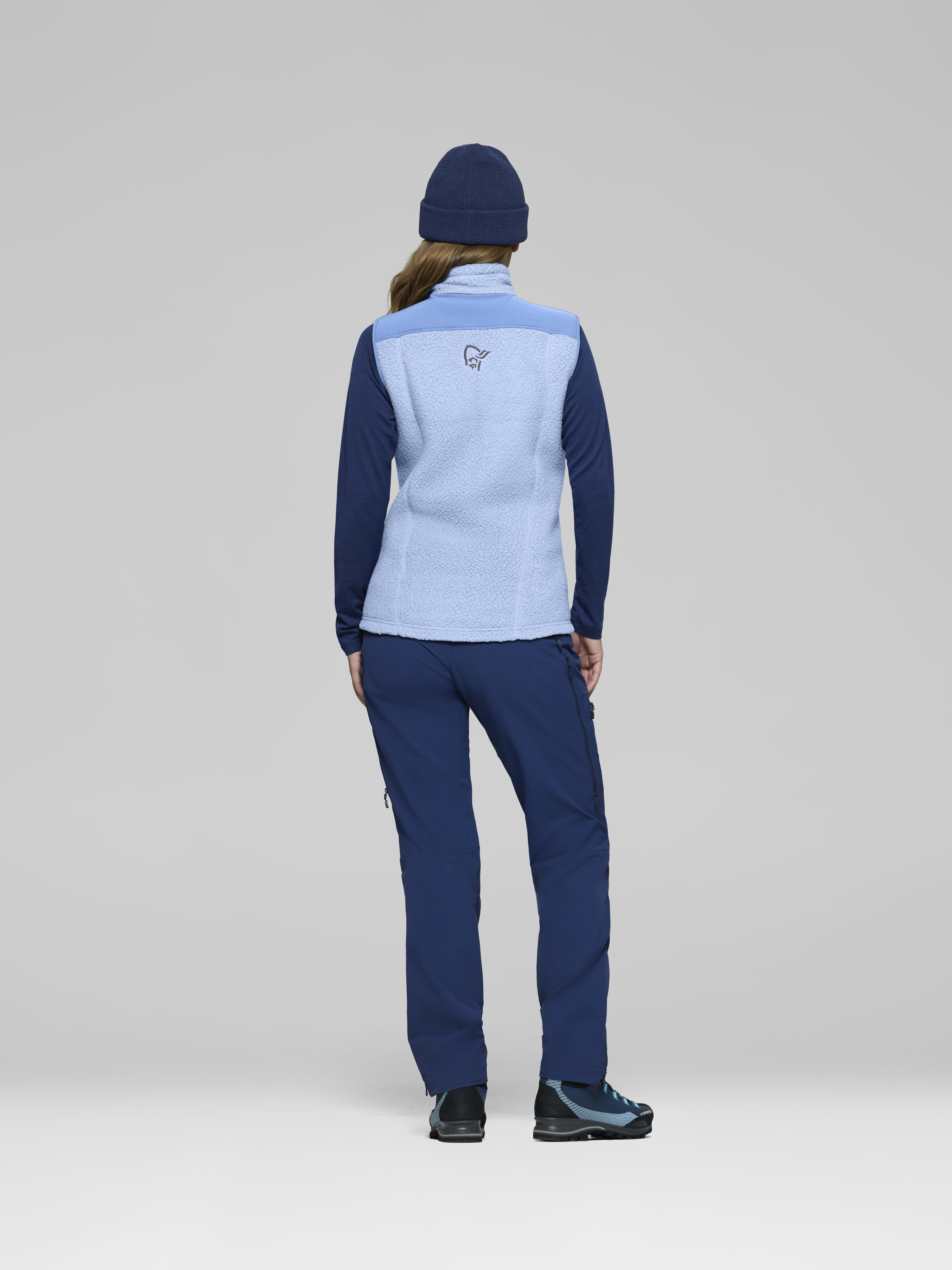 Female Look back image of trollveggen warm3 Vest Cashmere Blue/Allure