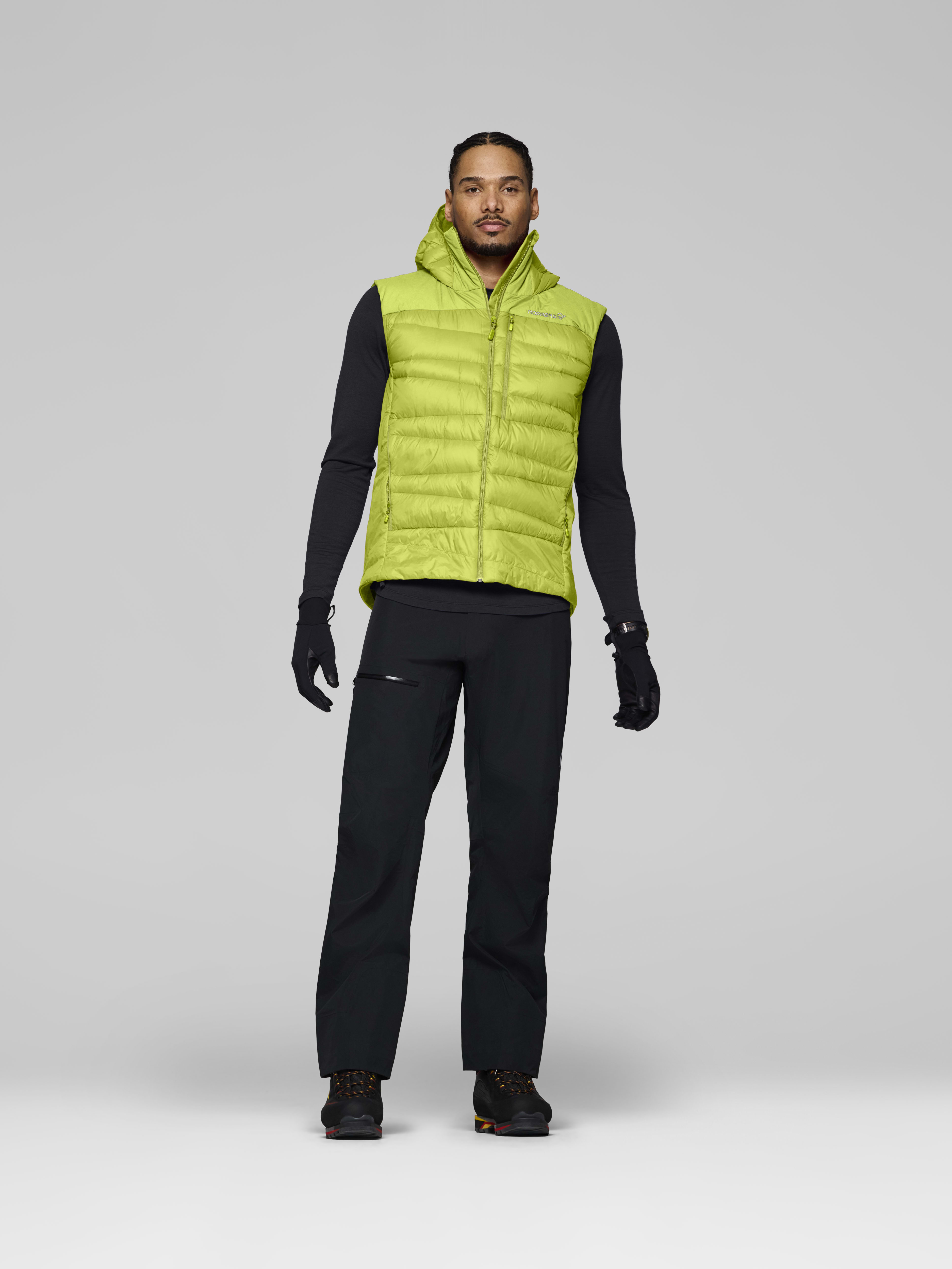 Male Look front image of falketind down750 Vest Dark Citron/Tender Shoots