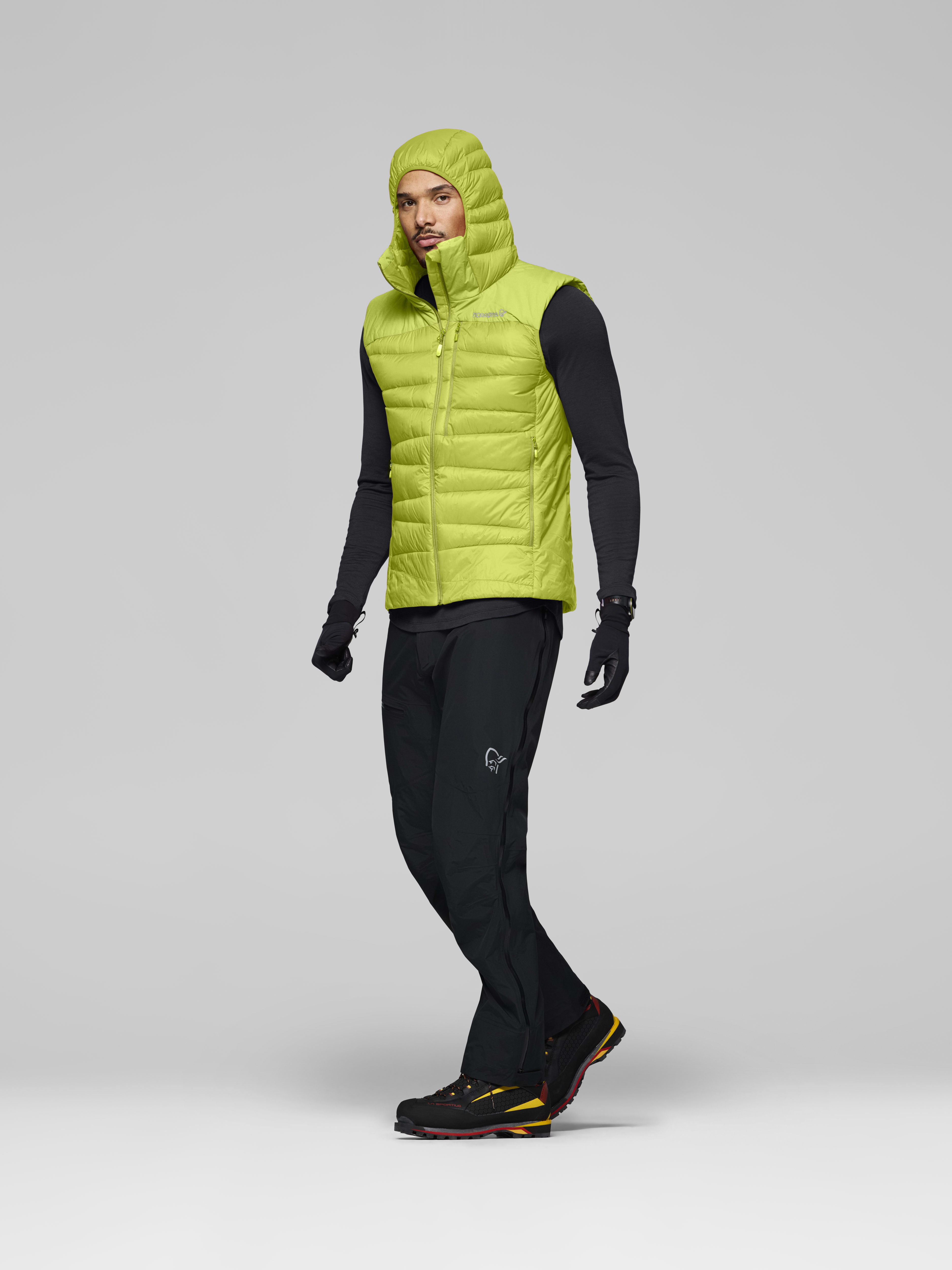 Male Look side image of falketind down750 Vest Dark Citron/Tender Shoots