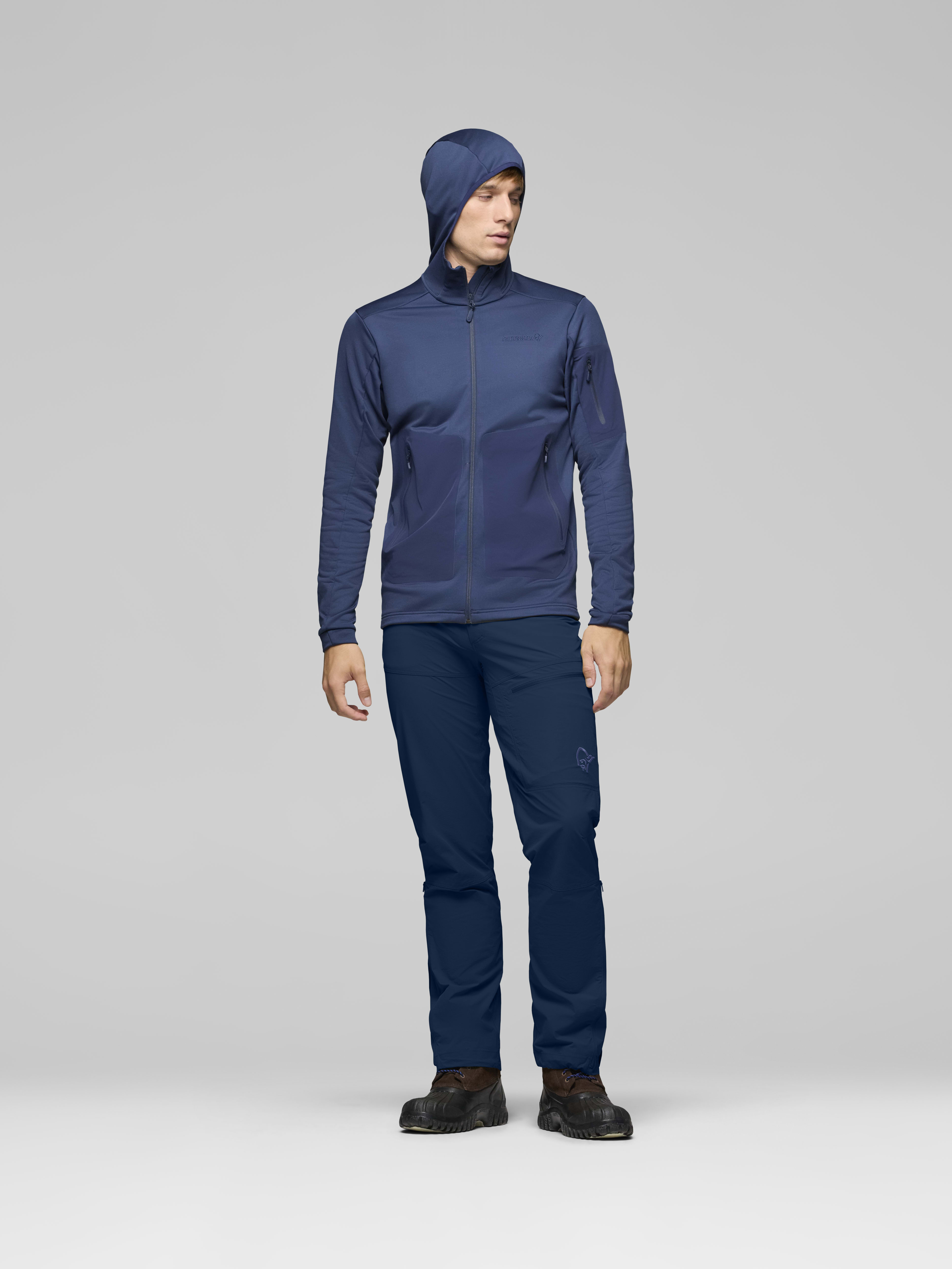 Male Look opening image of falketind warm2 stretch Hood Indigo Night
