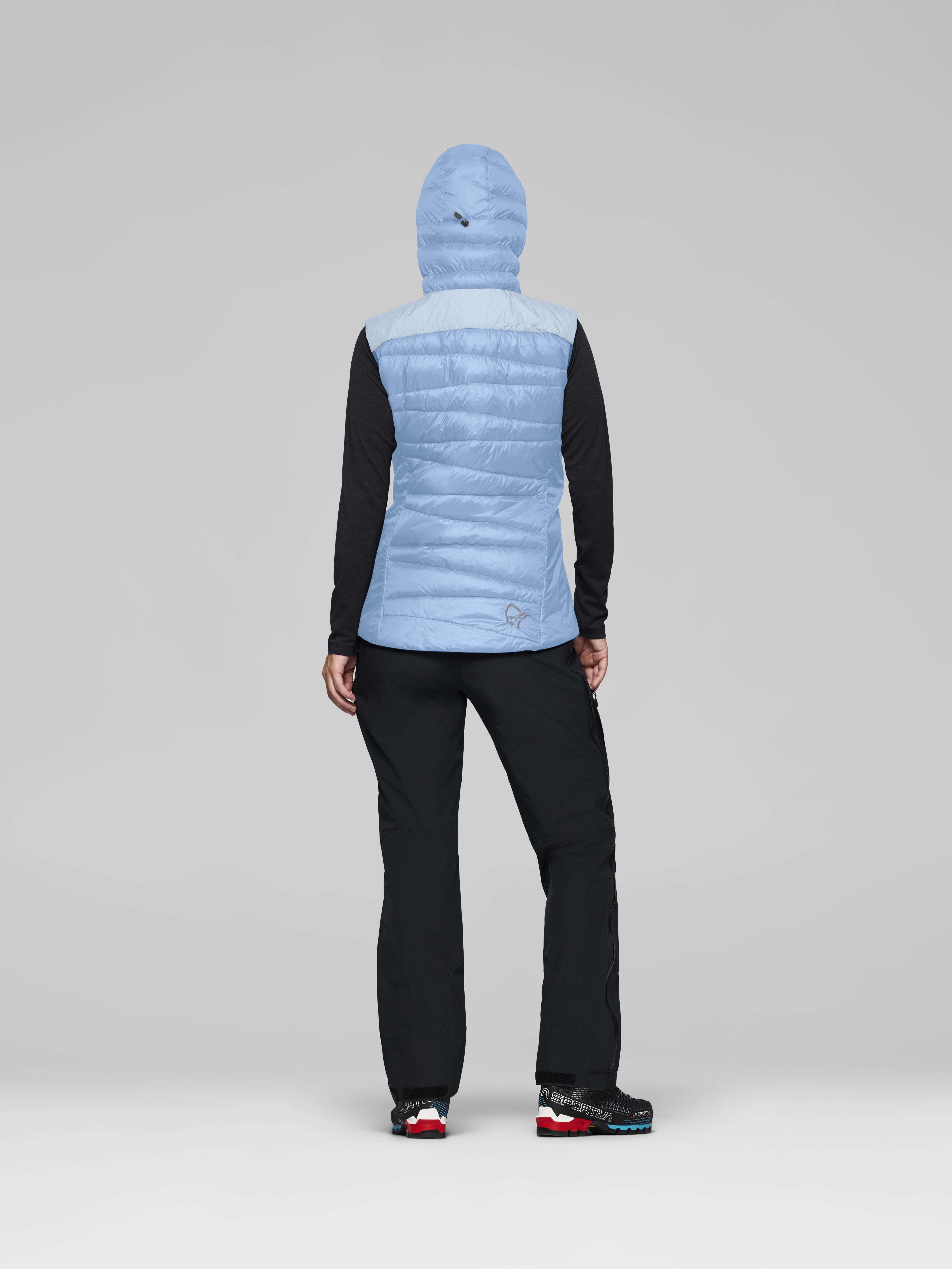 Female Look back image of falketind down750 Vest Allure/Cashmere Blue