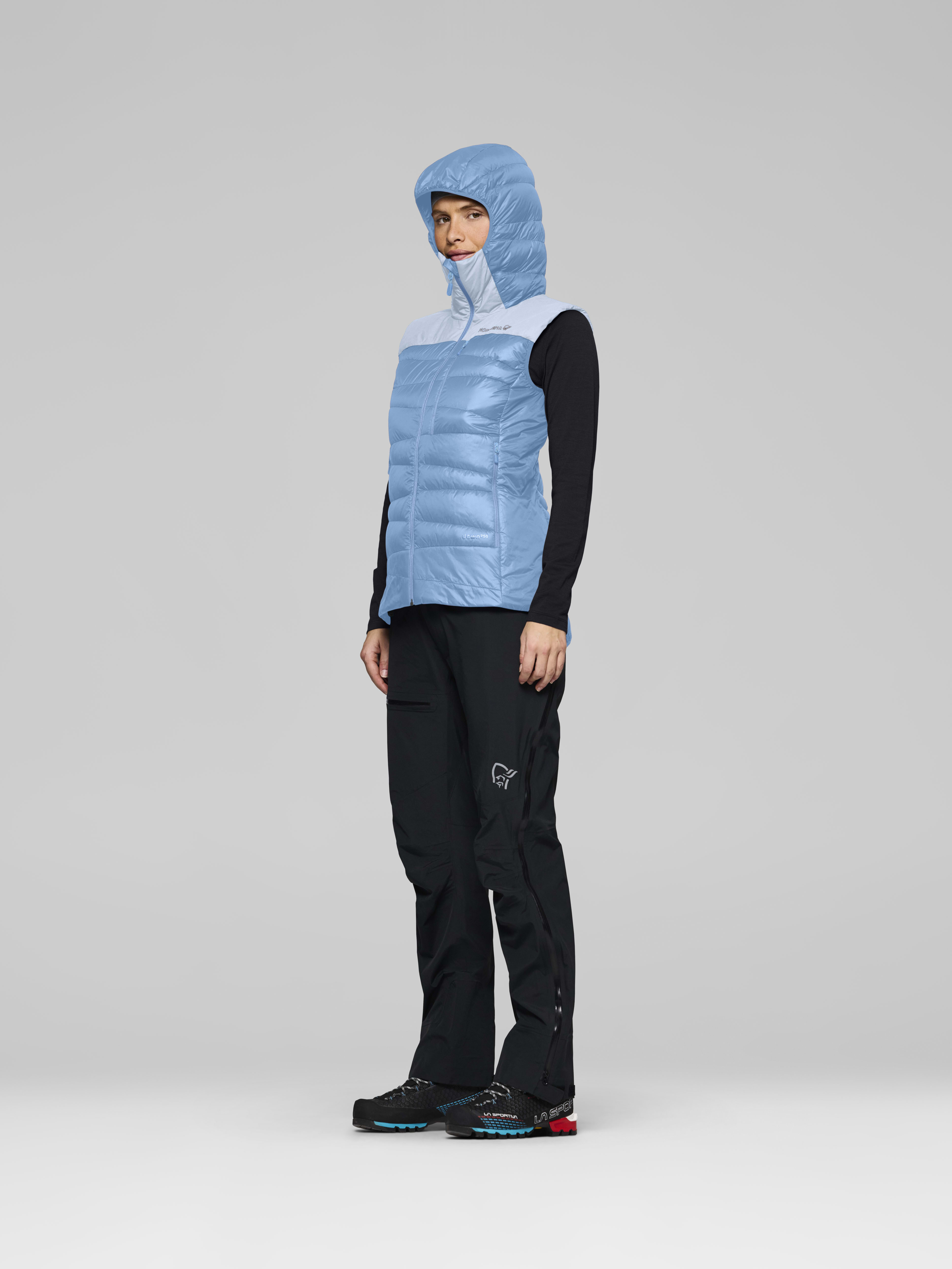 Female Look side image of falketind down750 Vest Allure/Cashmere Blue