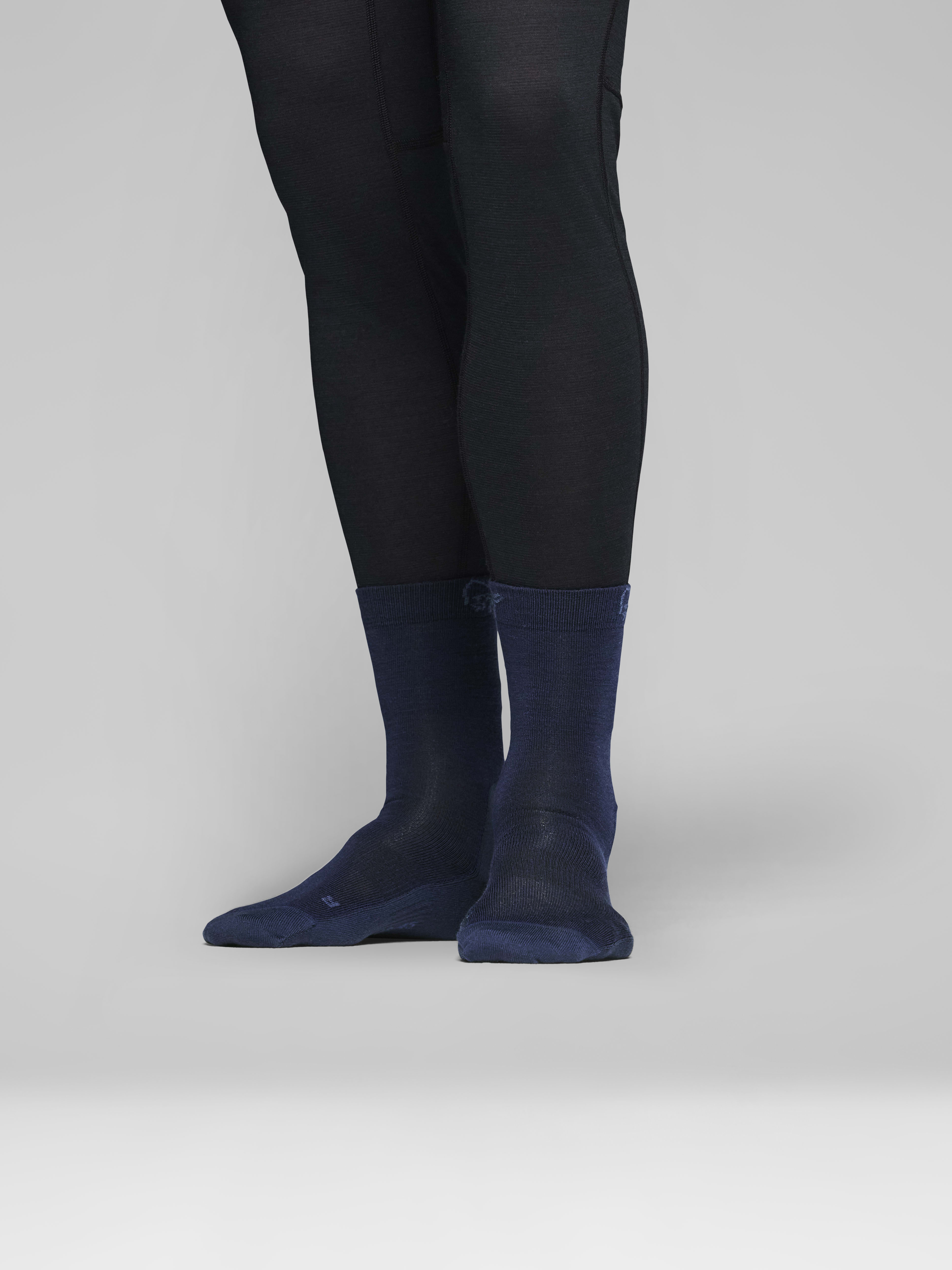 Female Look side image of falketind light merinoUll Socks Indigo Night/Dark Denim