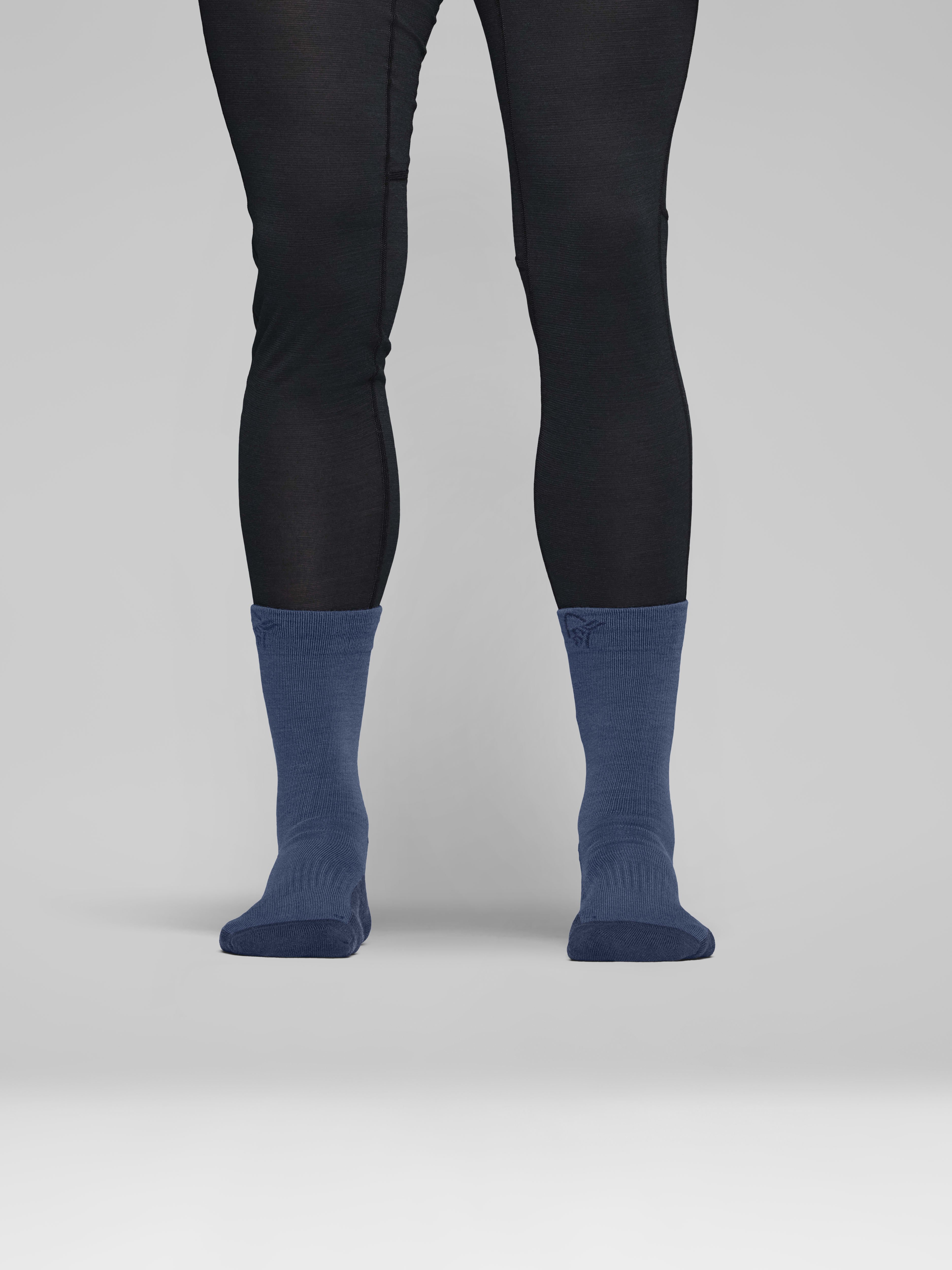 Female Look front image of falketind mid merinoUll Socks Indigo Night/Dark Denim