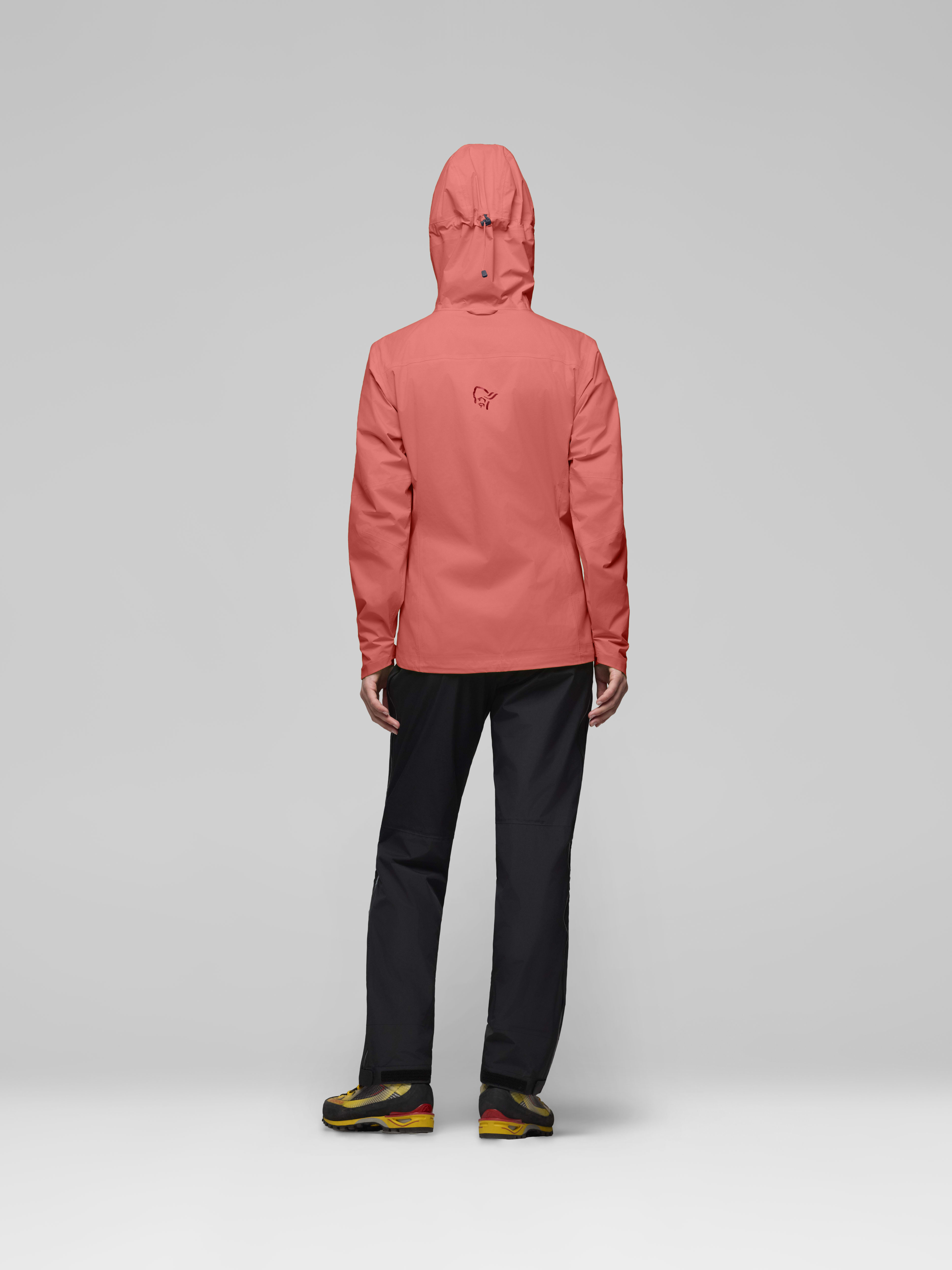 Female Look back image of falketind dri1 Jacket Deep Sea Coral