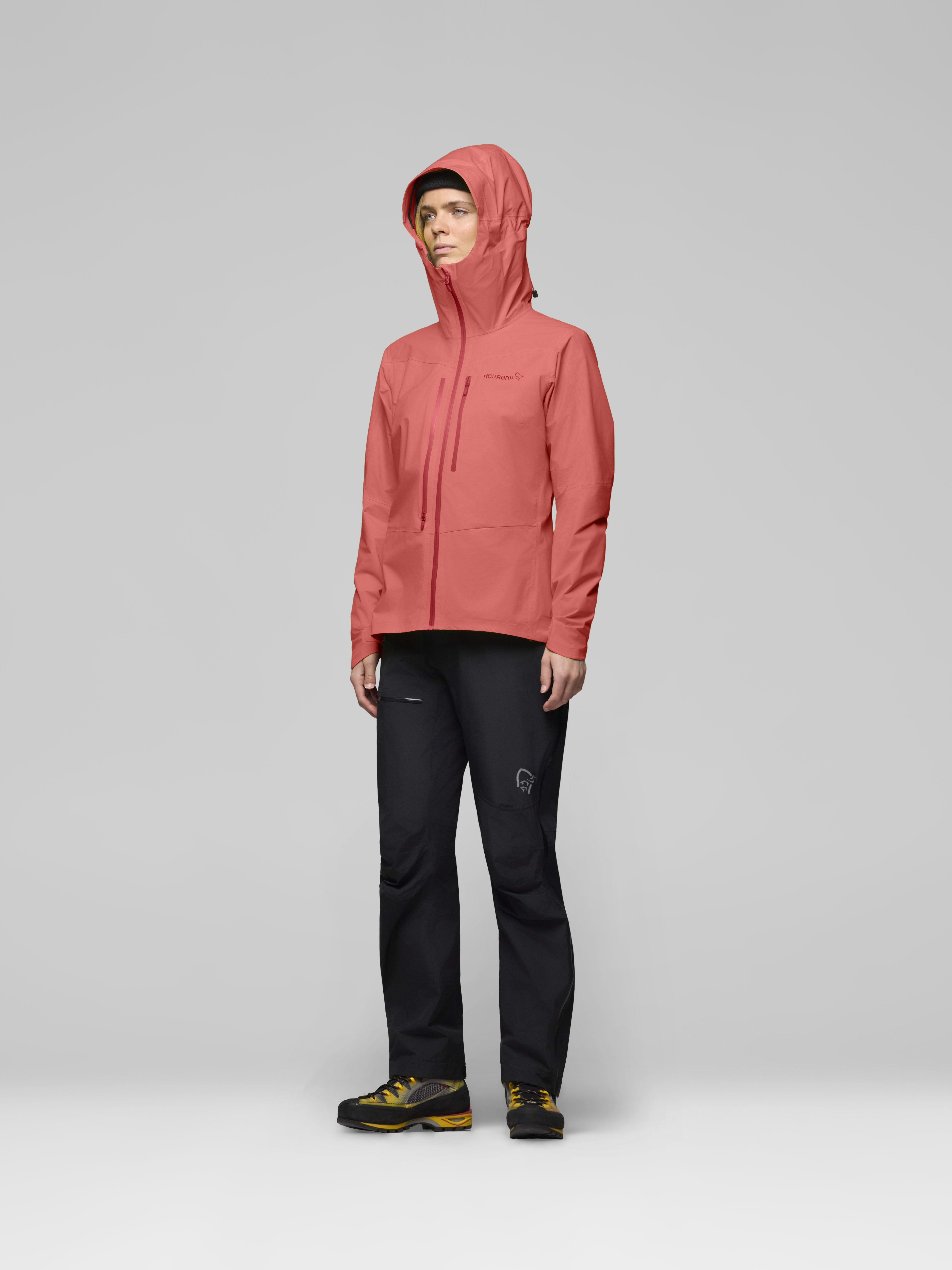 Female Look side image of falketind dri1 Jacket Deep Sea Coral