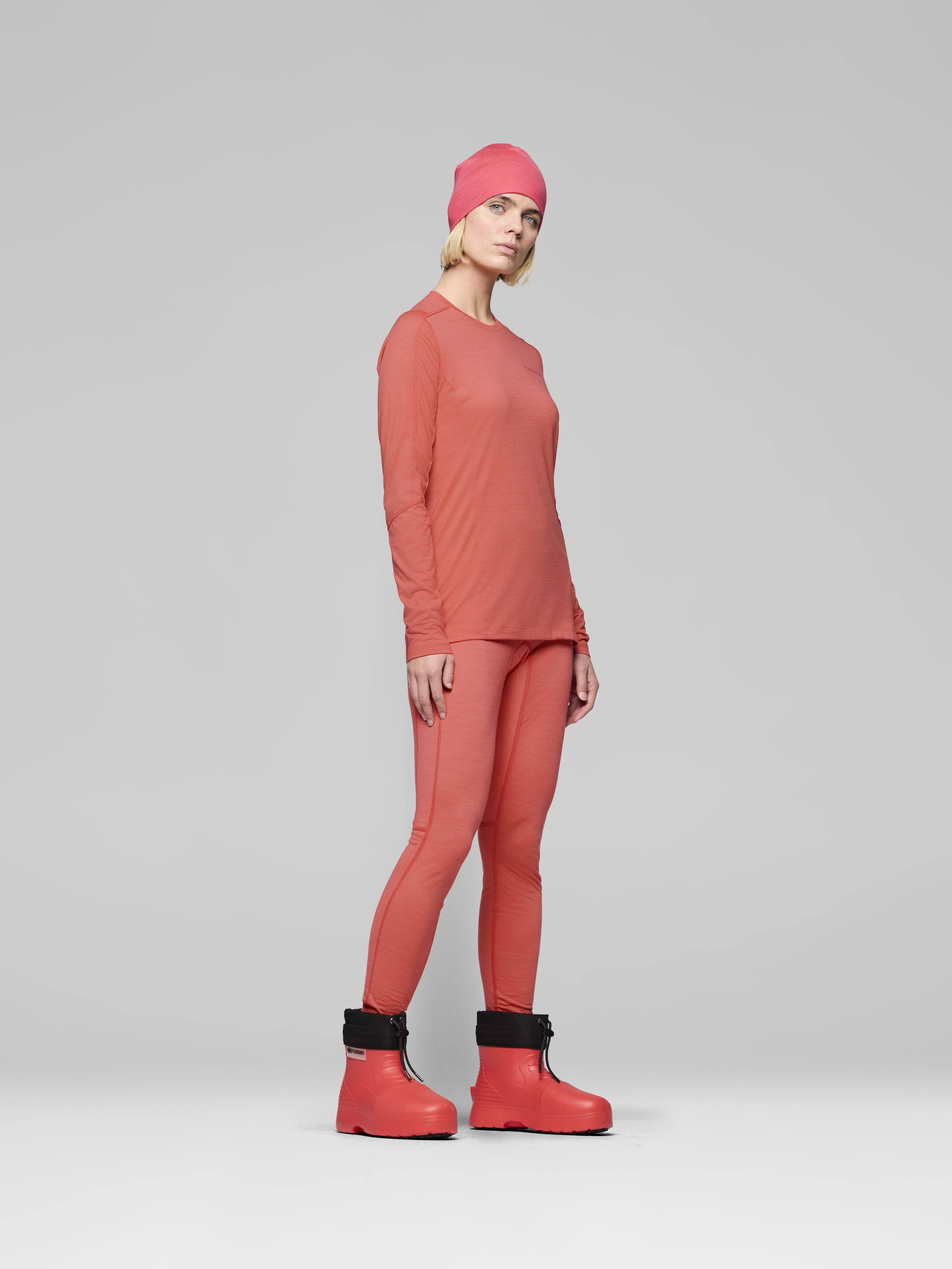 Female Look side image of falketind equaliserUll Long Sleeve Deep Sea Coral