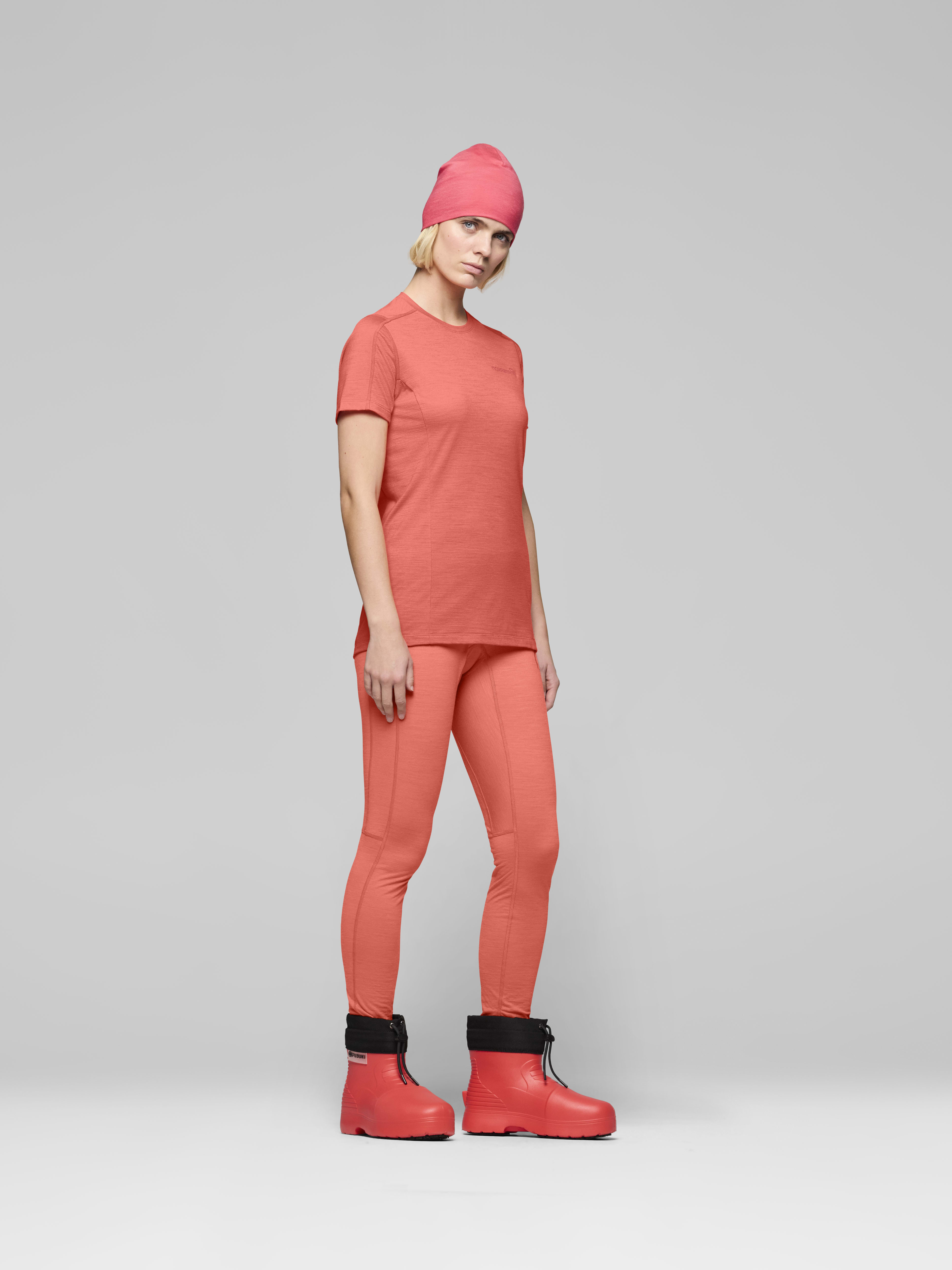 Female Look side image of falketind equaliserUll T-shirt Deep Sea Coral