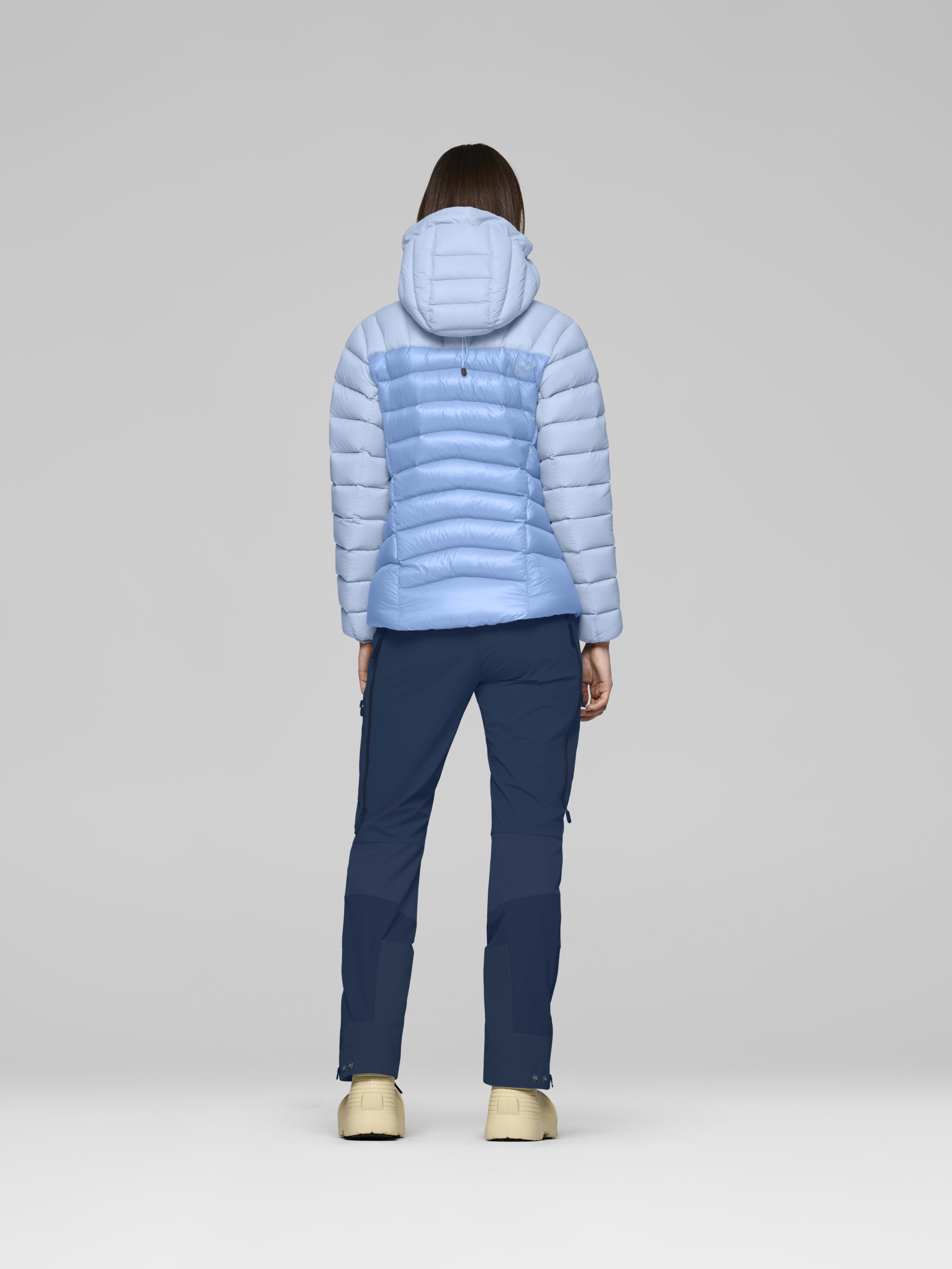 Female Look back image of lyngen down850 Hood Allure/Cashmere Blue
