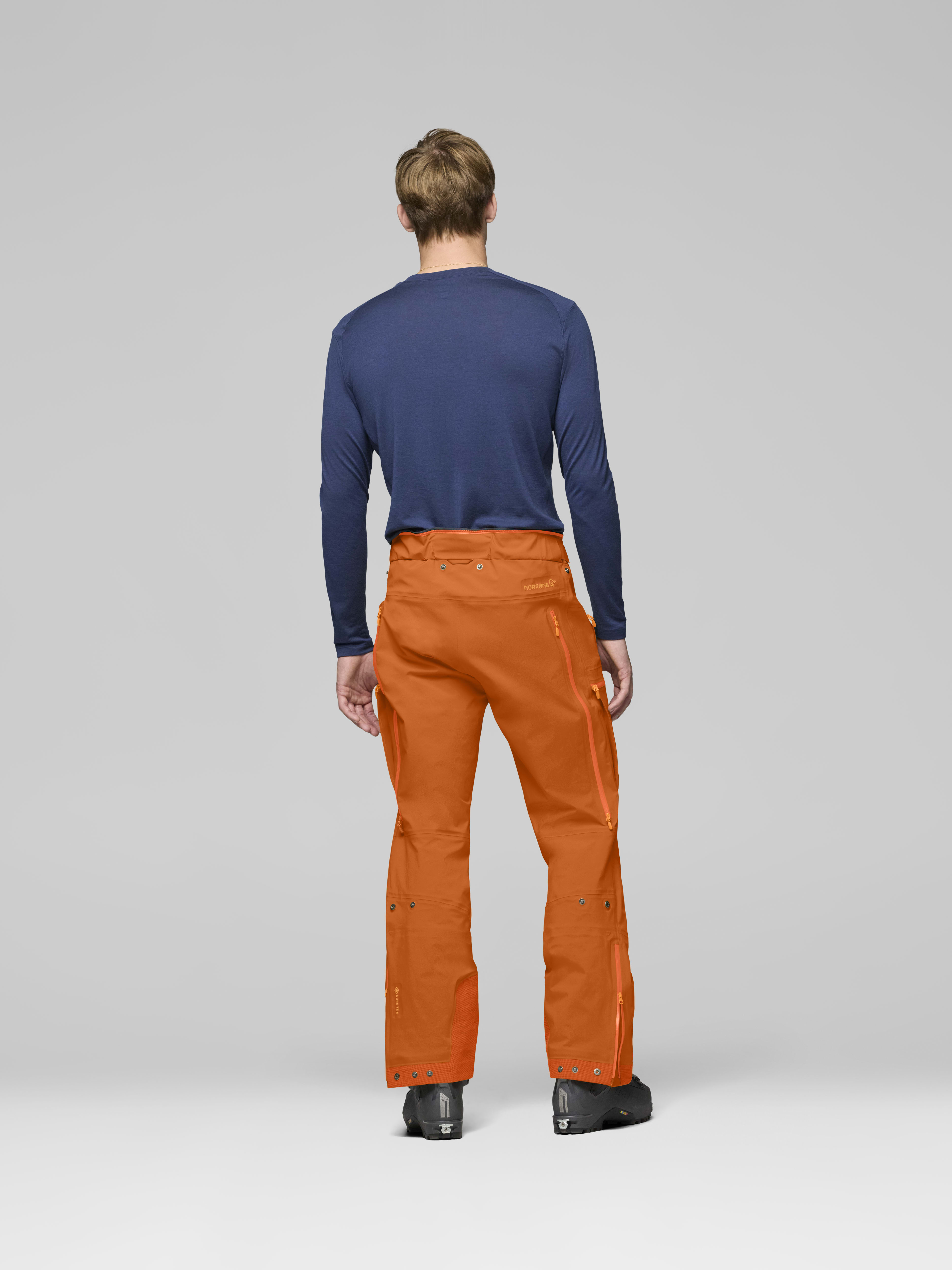 Male Look back image of lyngen Gore-Tex Pants Gold Flame