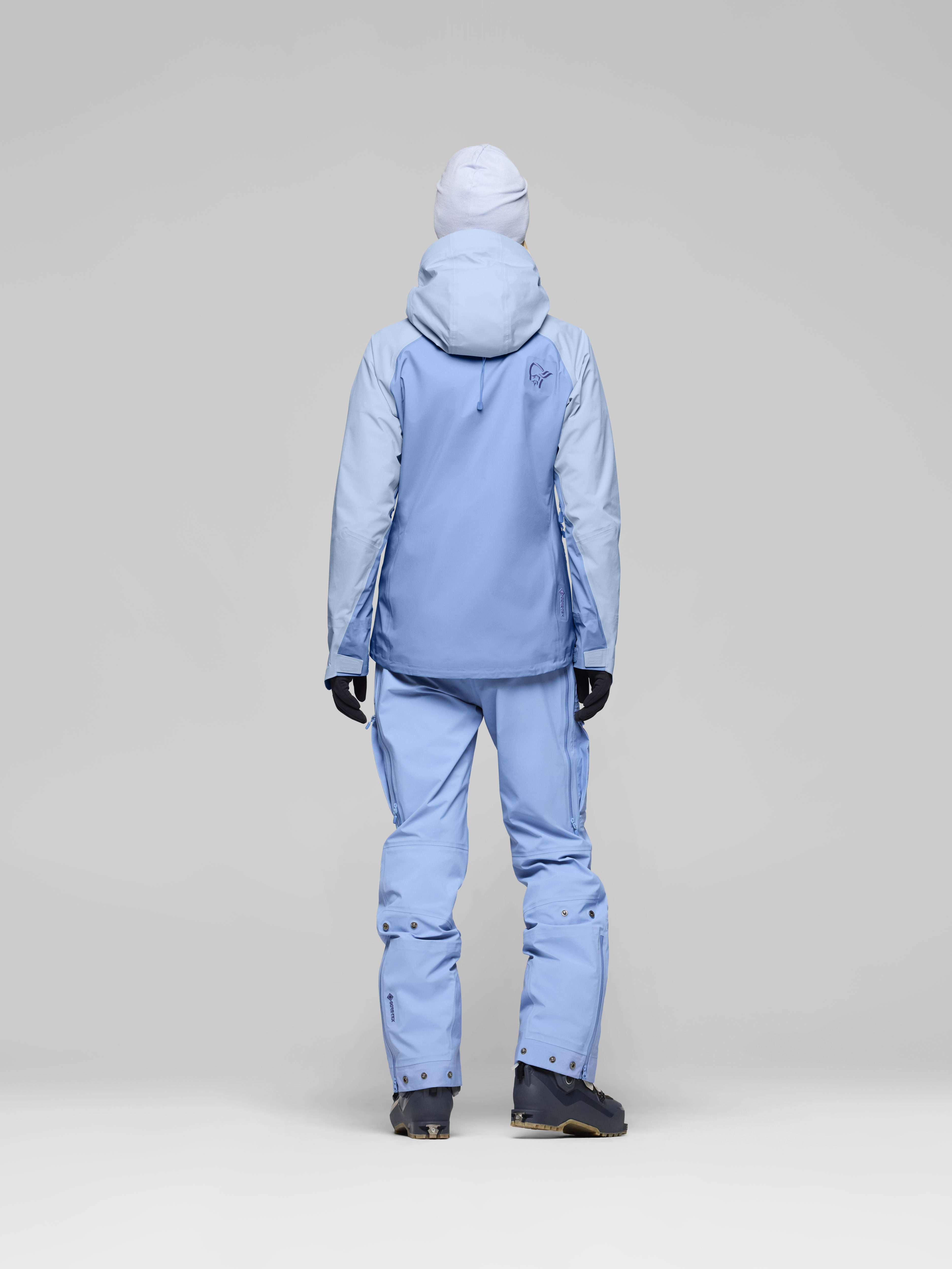 Female Look back image of lyngen Gore-Tex Jacket Allure/Cashmere Blue