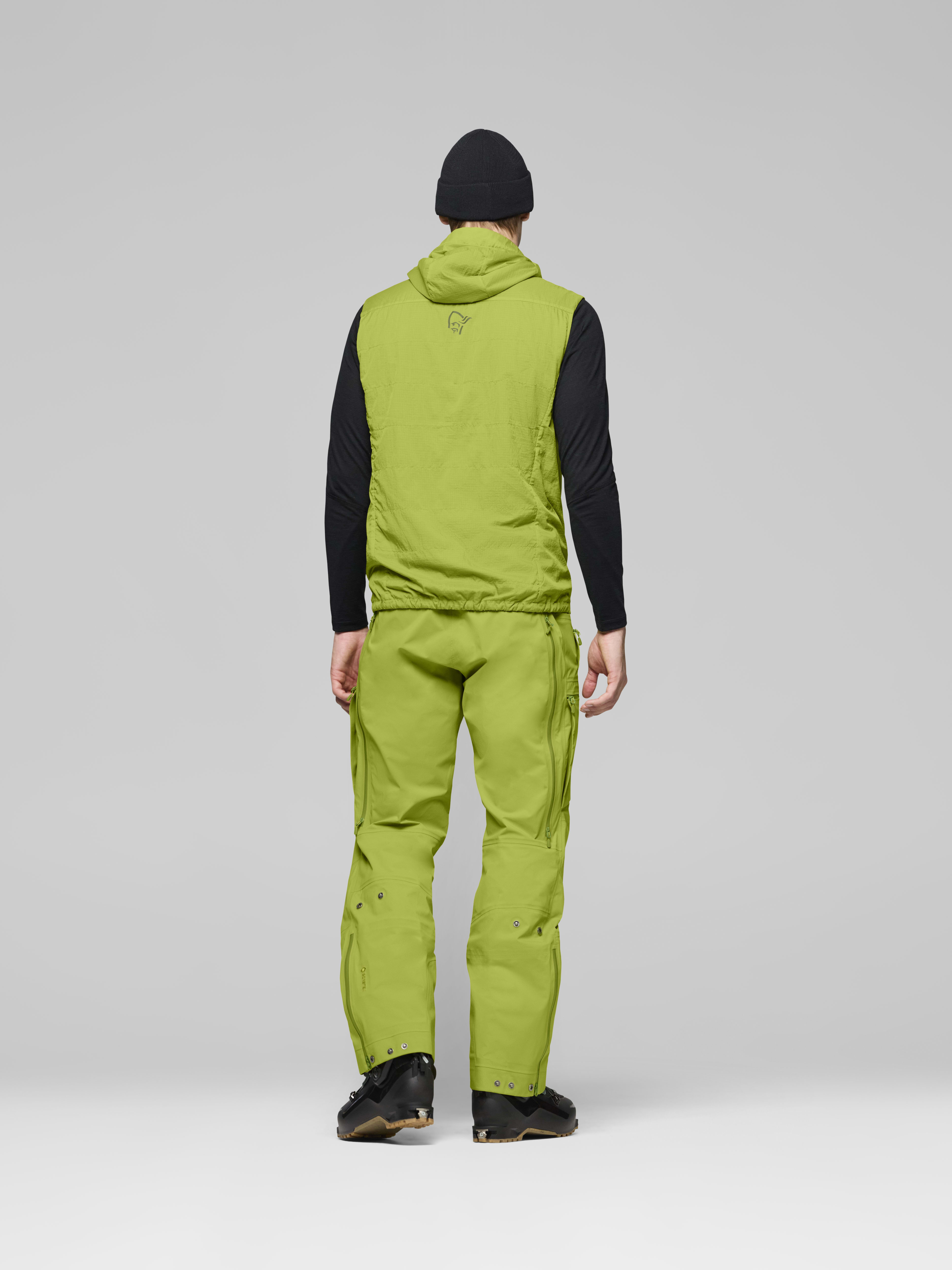 Male Look back image of lyngen thermo100active Vest Dark Citron