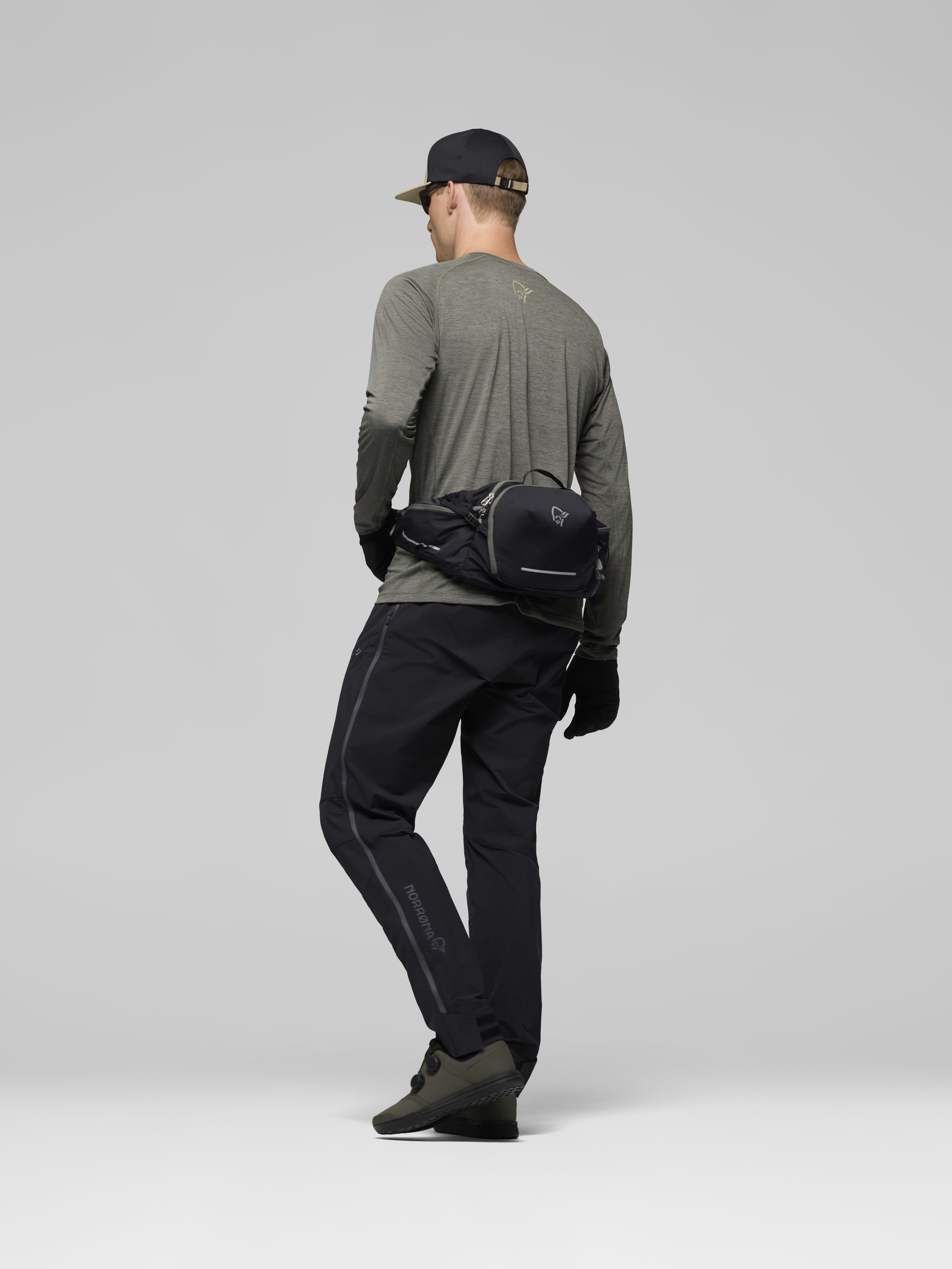 Female Look side image of fjora econyl195 6L Hip Pack Caviar Black