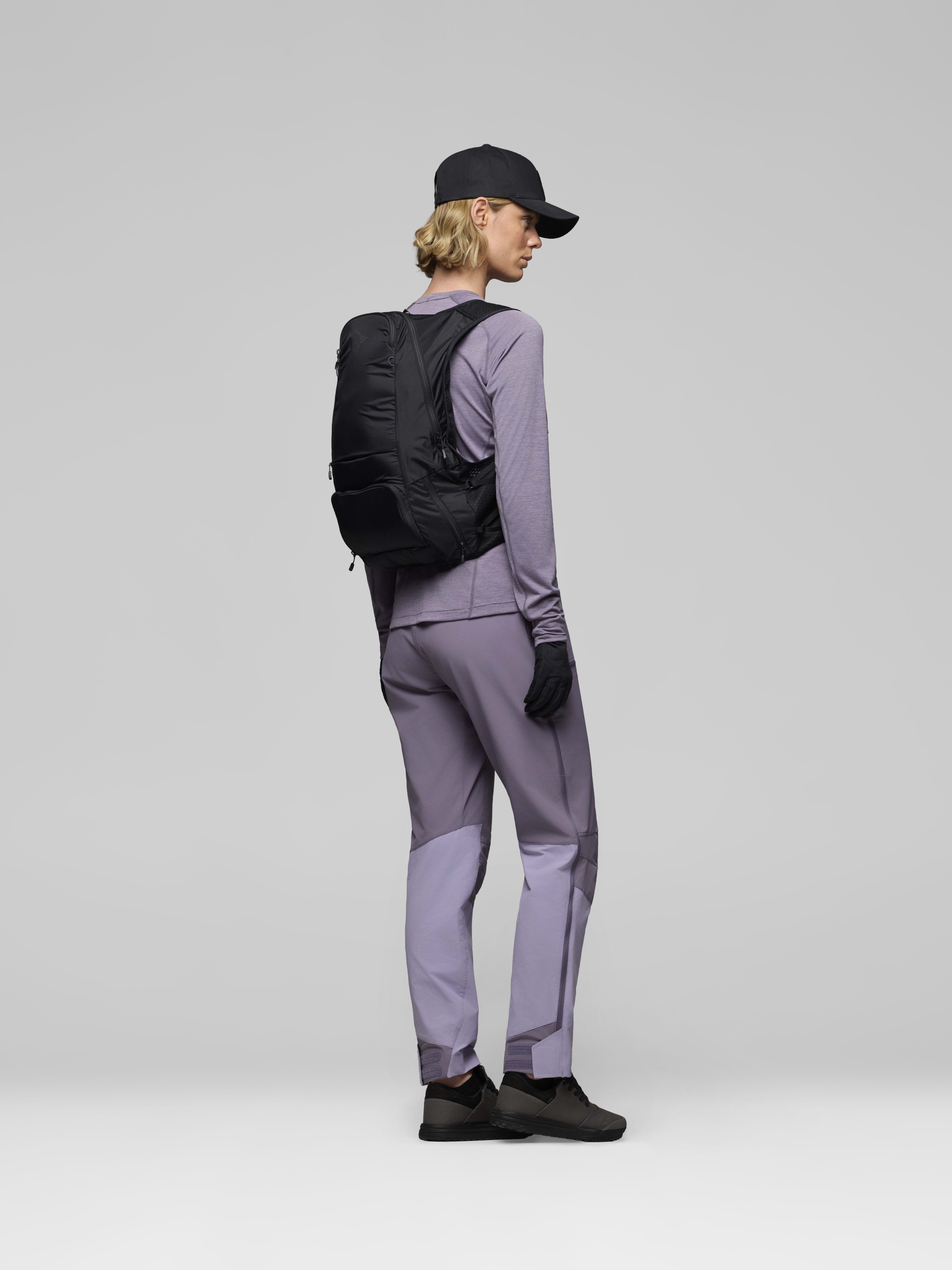 Female Look side image of fjora econyl70 15L Pack Caviar Black