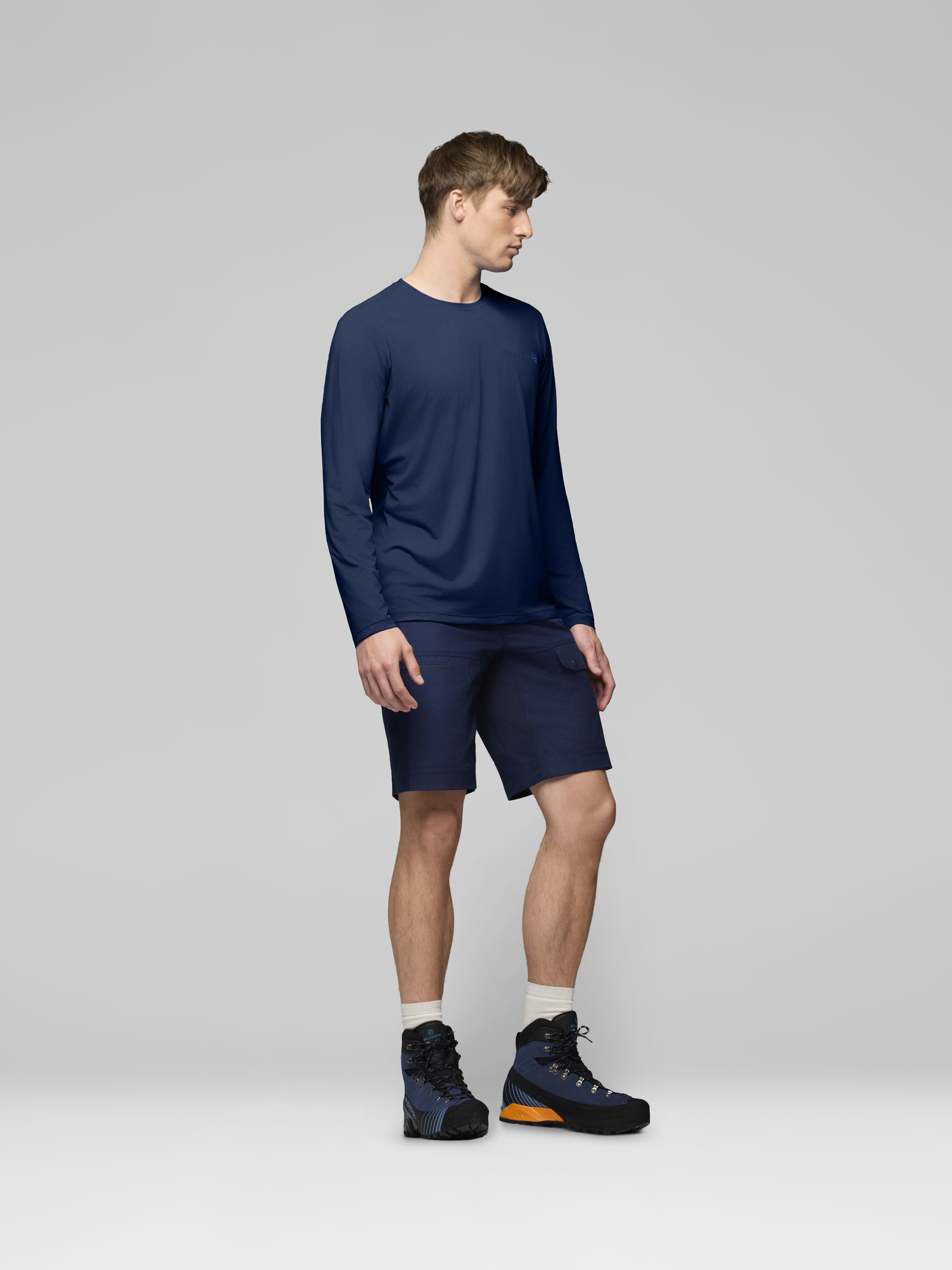 Male Look side image of femund tech Long Sleeve Indigo Night