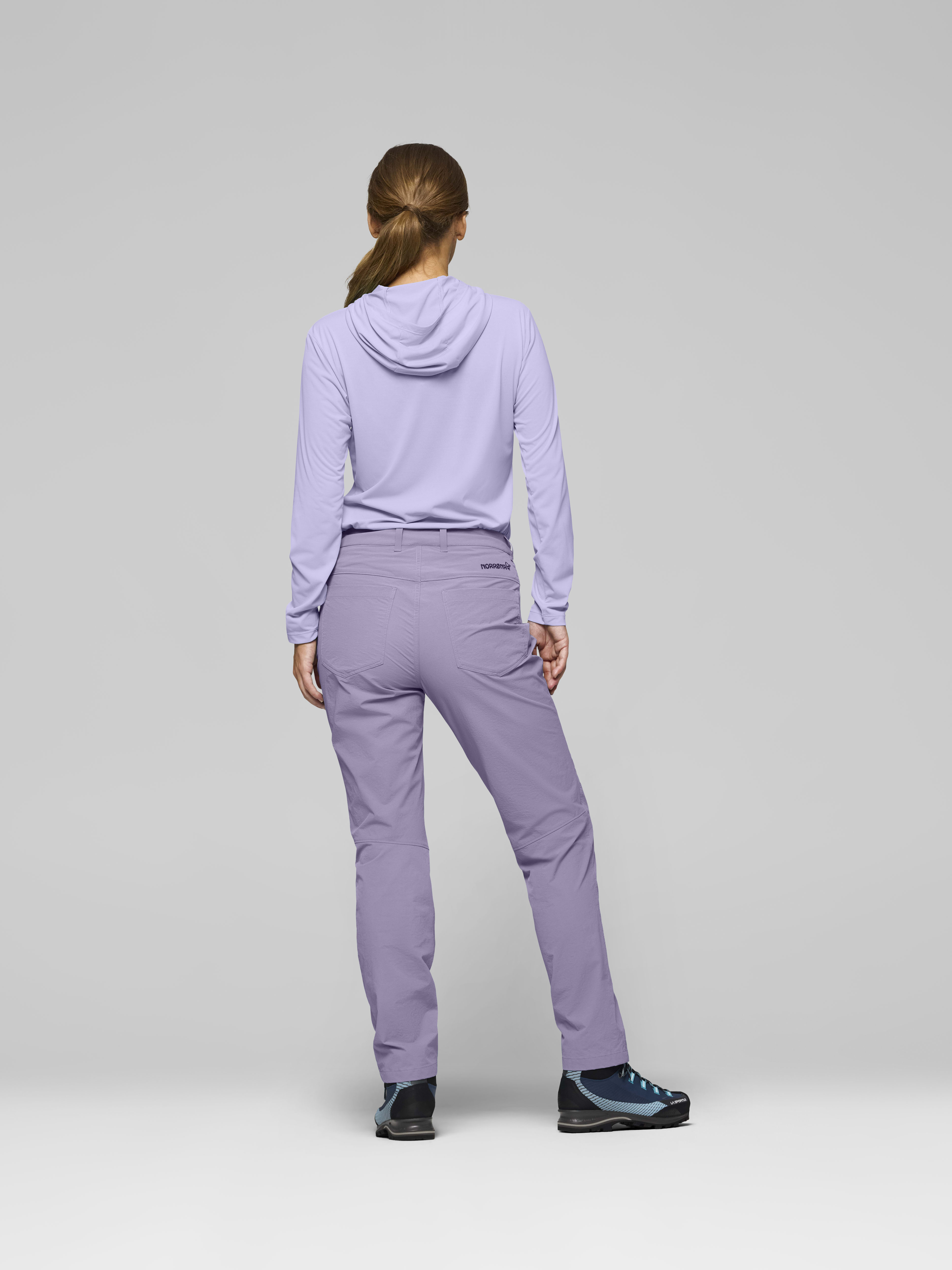 Female Look back image of femund flex1 tech Pants Purple Sage