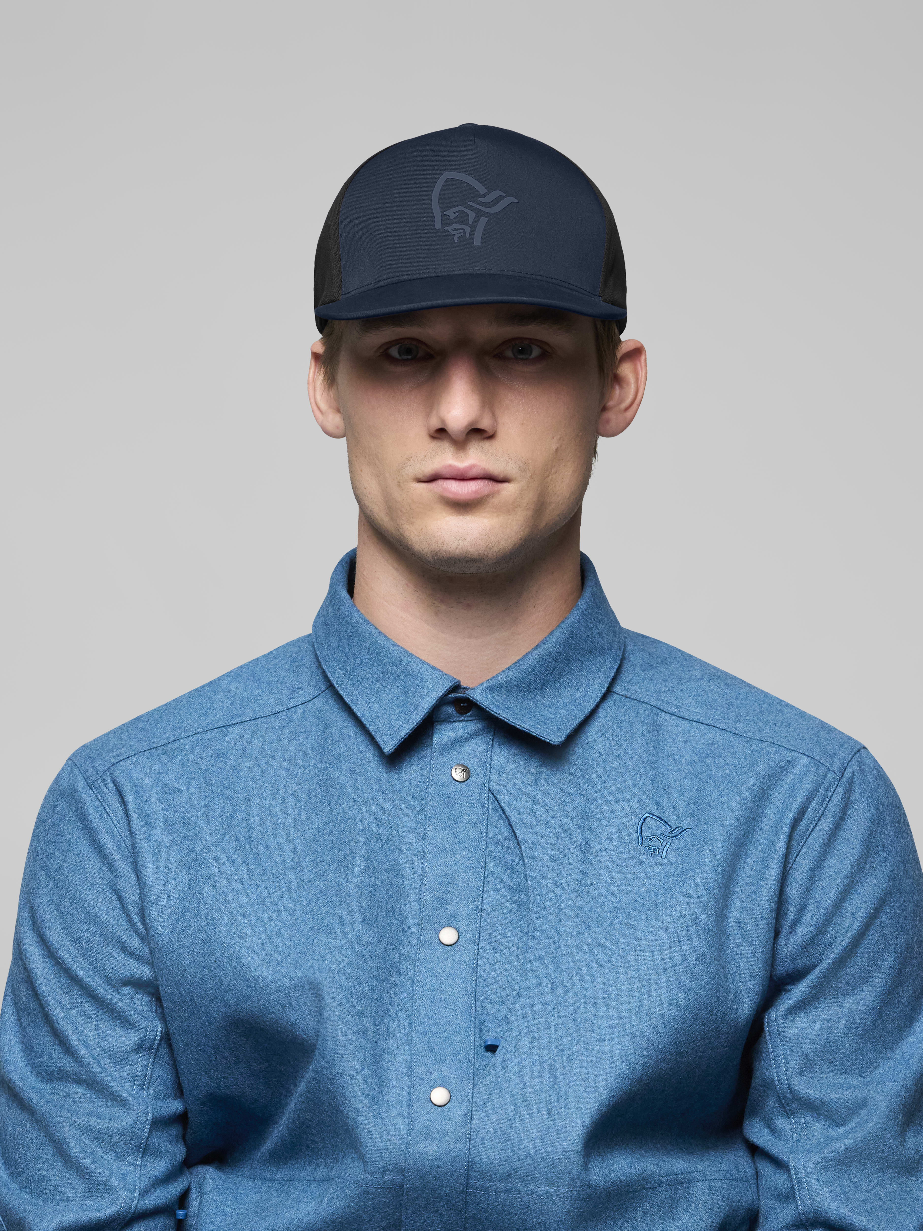 Female Look front image of 29 tech trucker Cap Indigo Night