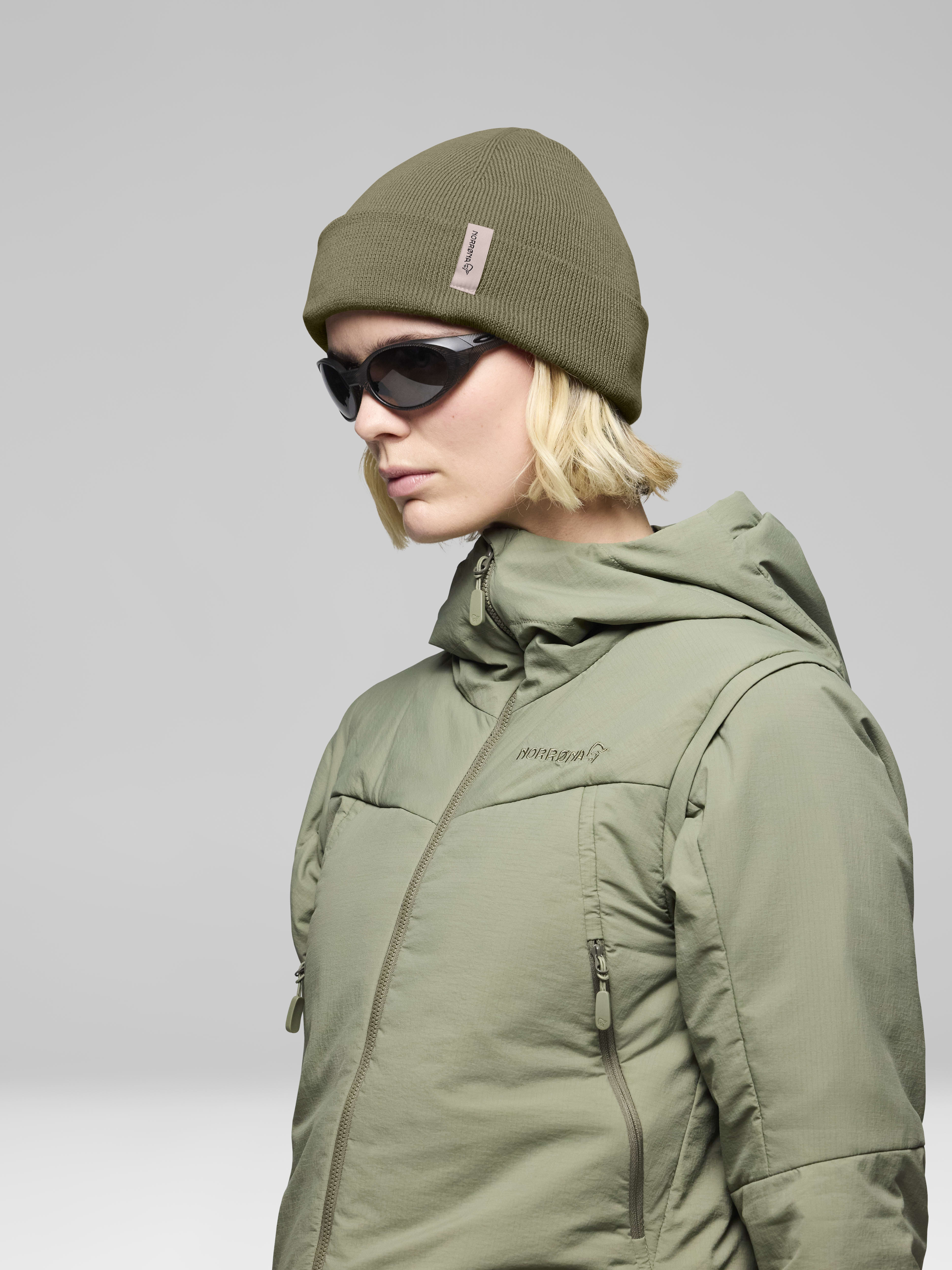 Female Look side image of 29 equaliser Beanie Deep Lichen Green