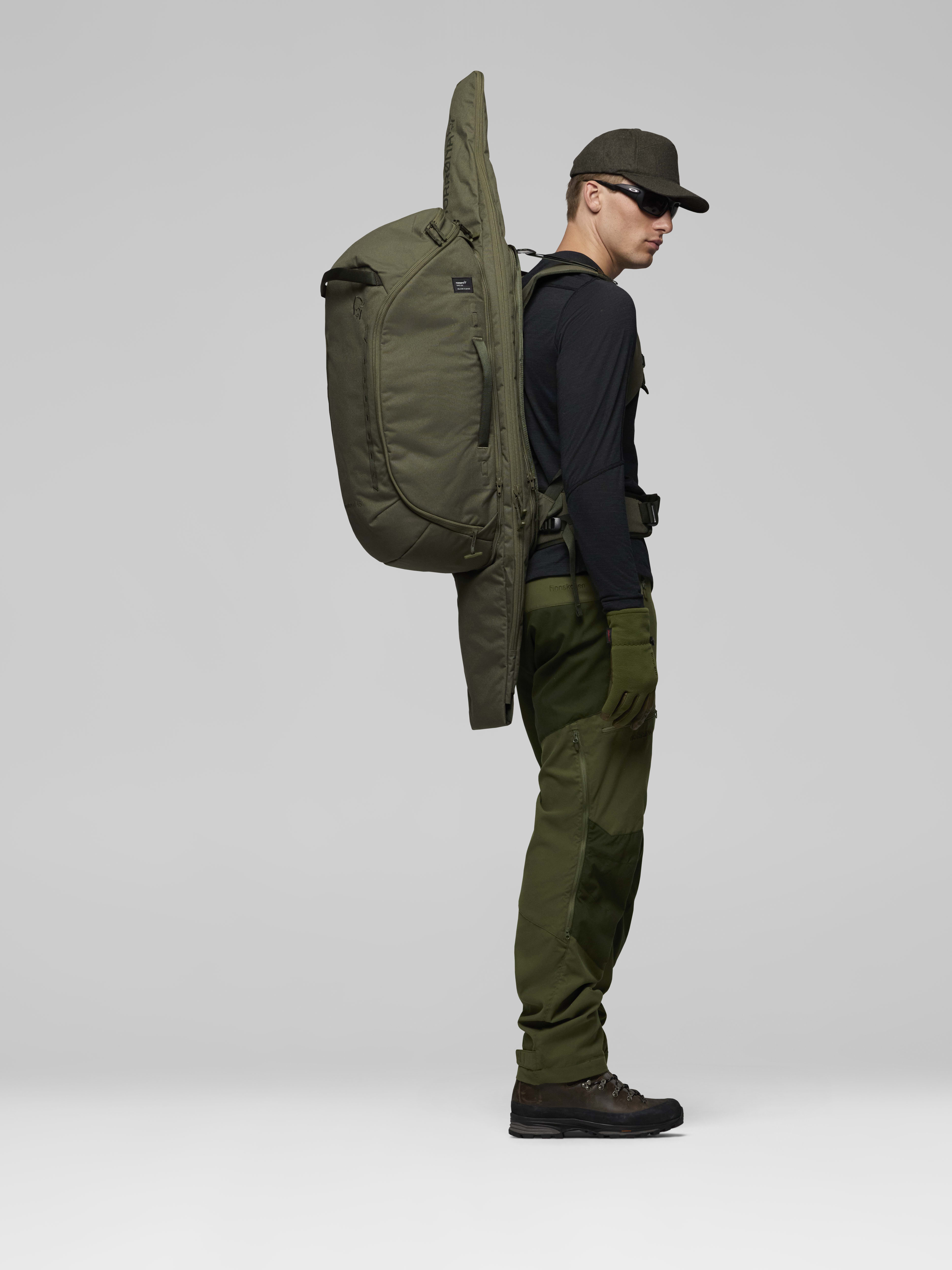 Female Look side image of kvinnherad 45L Pack Olive Night