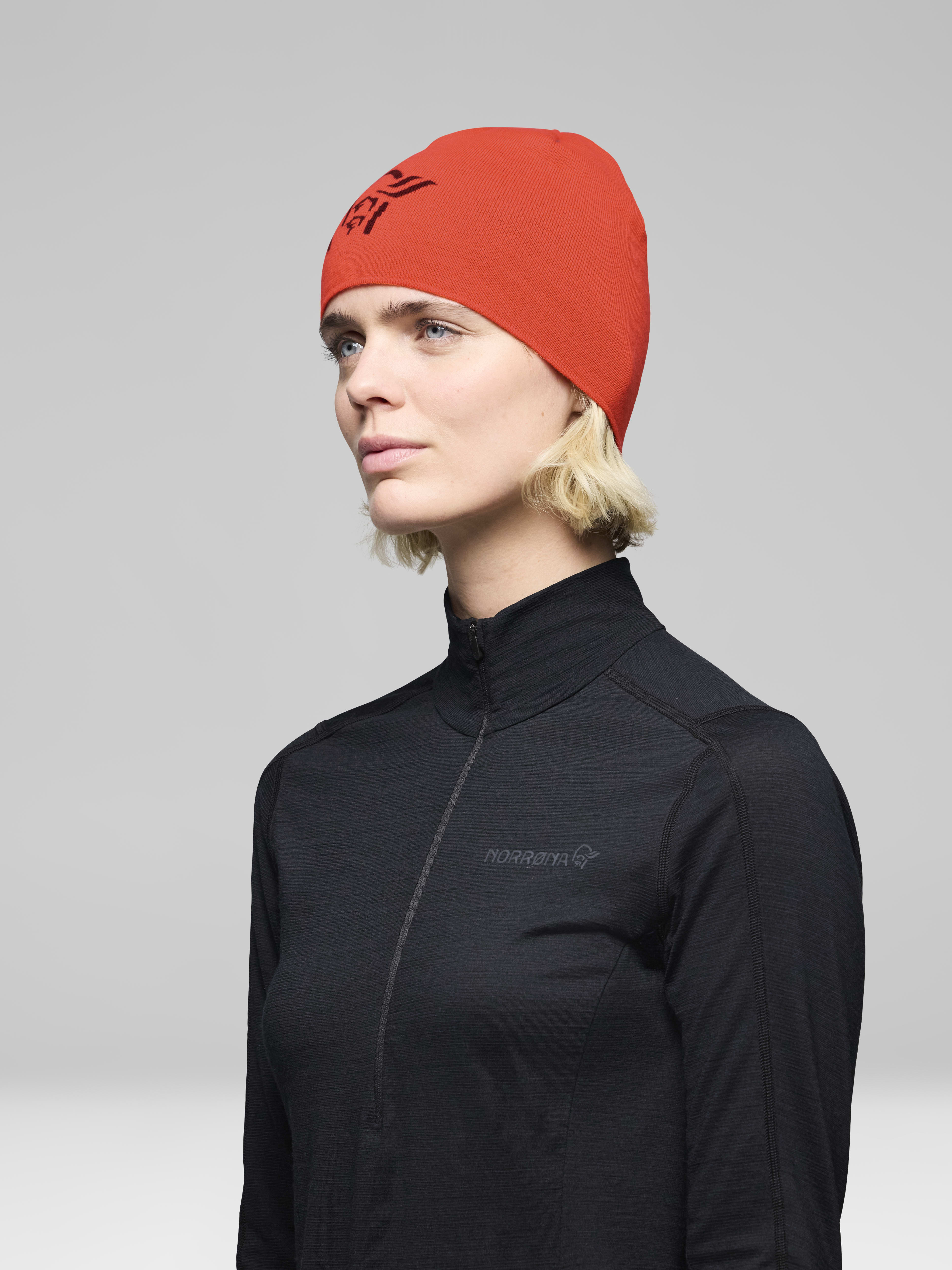 Female Look side image of 29 light merinoUll logo Beanie Baked Apple