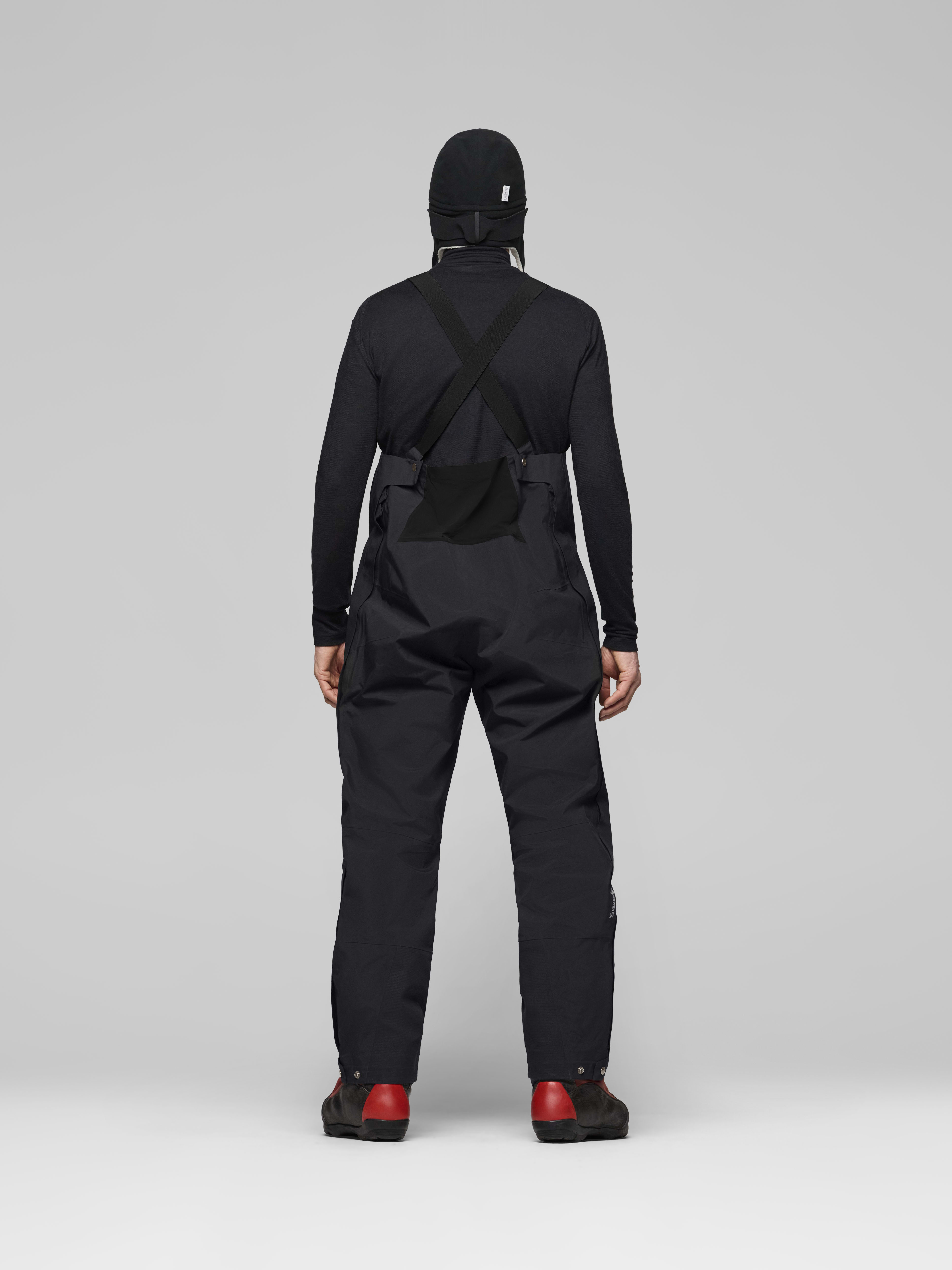Male Look back image of arktis Gore-Tex Pro Ousland Edition Bibs Caviar Black
