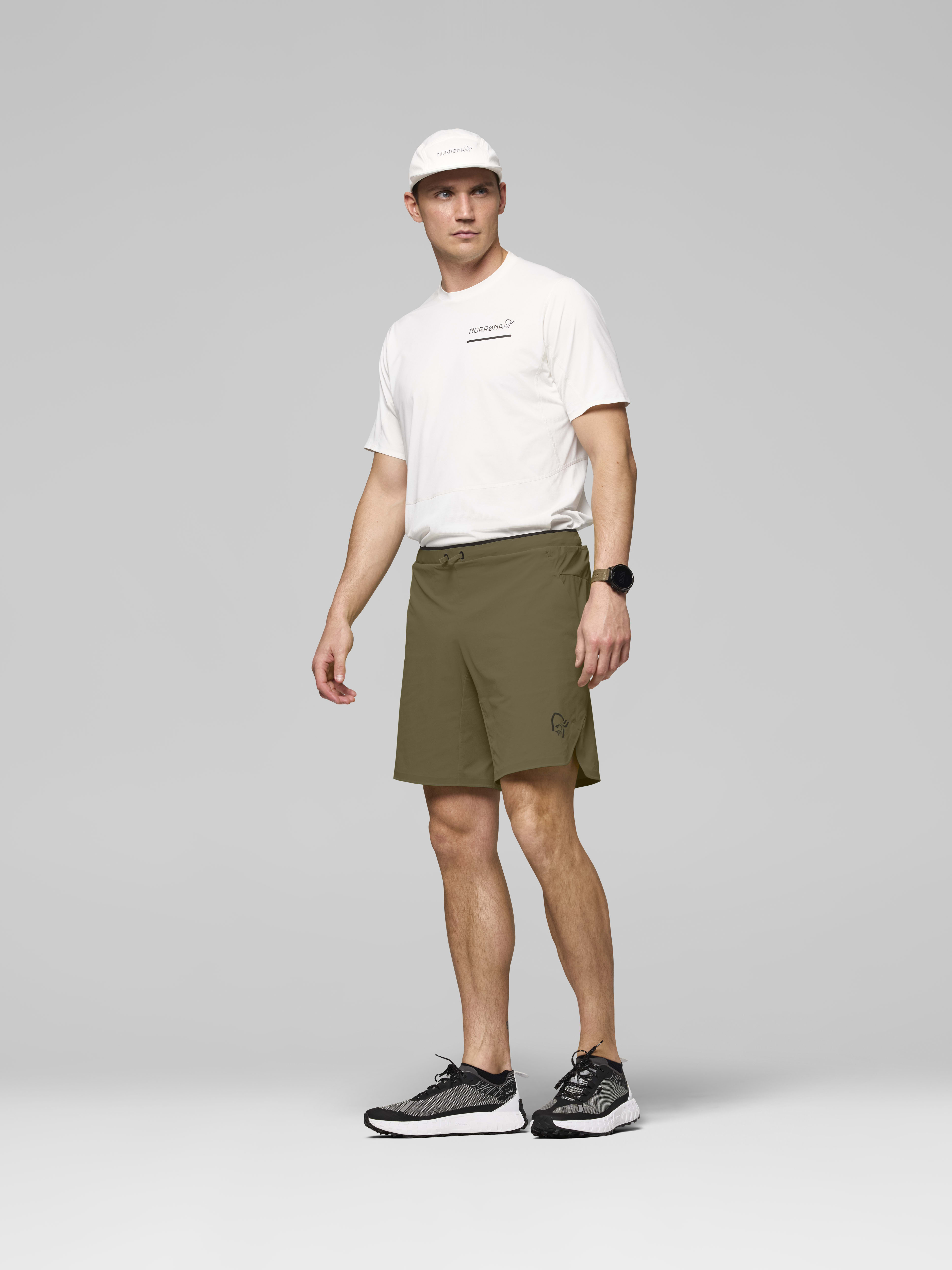 Male Look side image of senja flex1 9" Shorts Olive Night