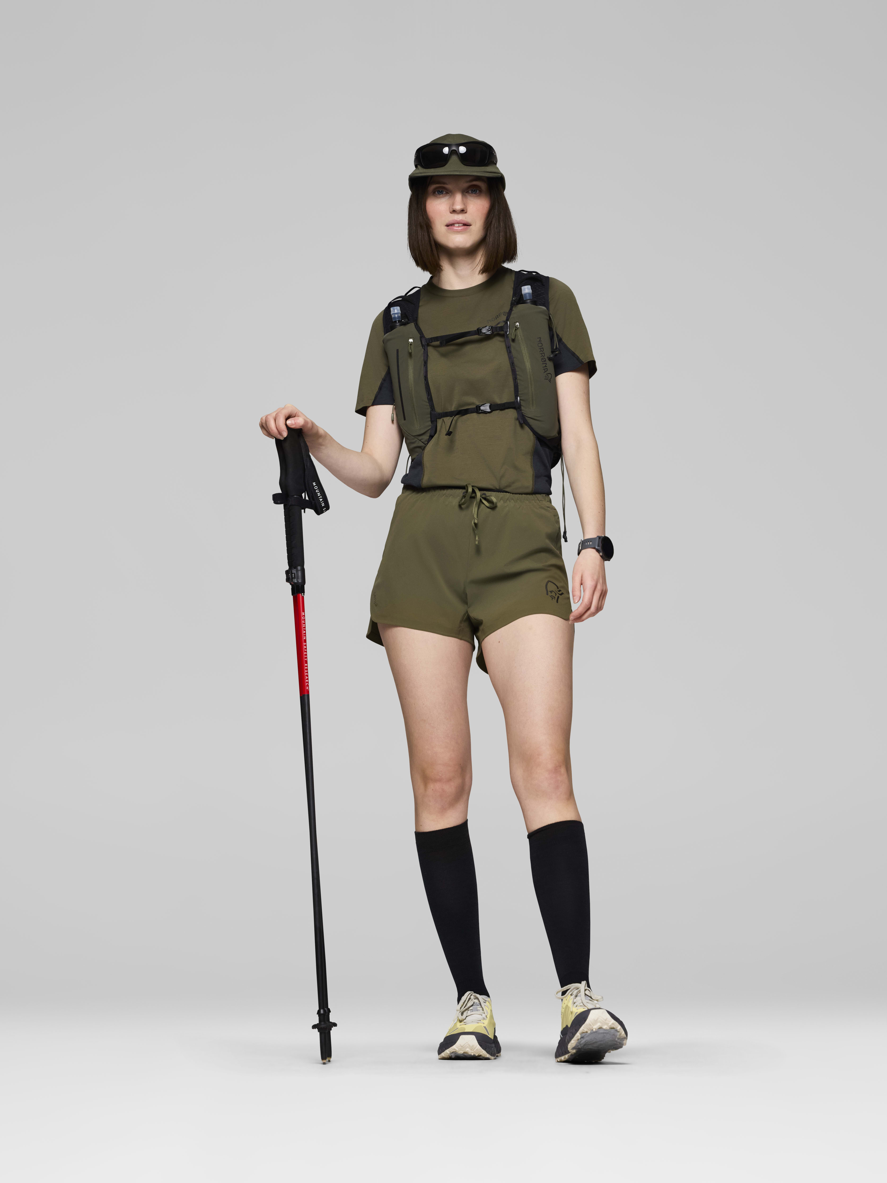 Female Look opening image of senja flex1 4" Shorts Olive Night